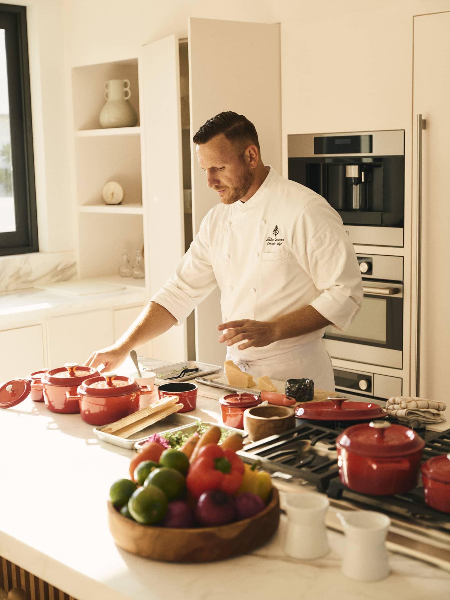 Chef preparing a meal in a kitchen