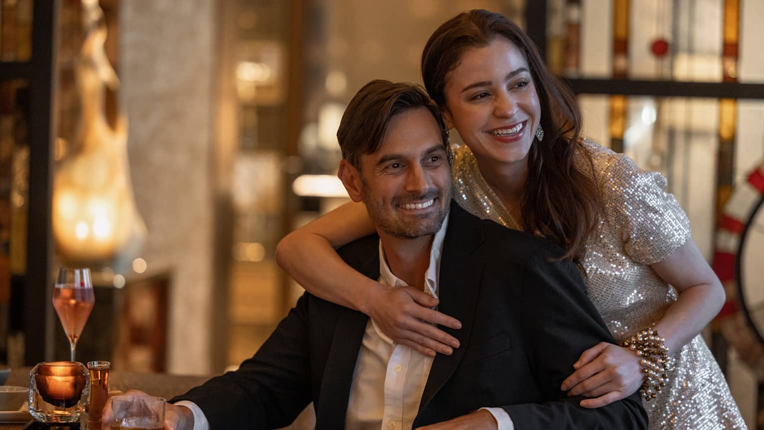 Smiling couple enjoying a Christmas celebration in Tokyo