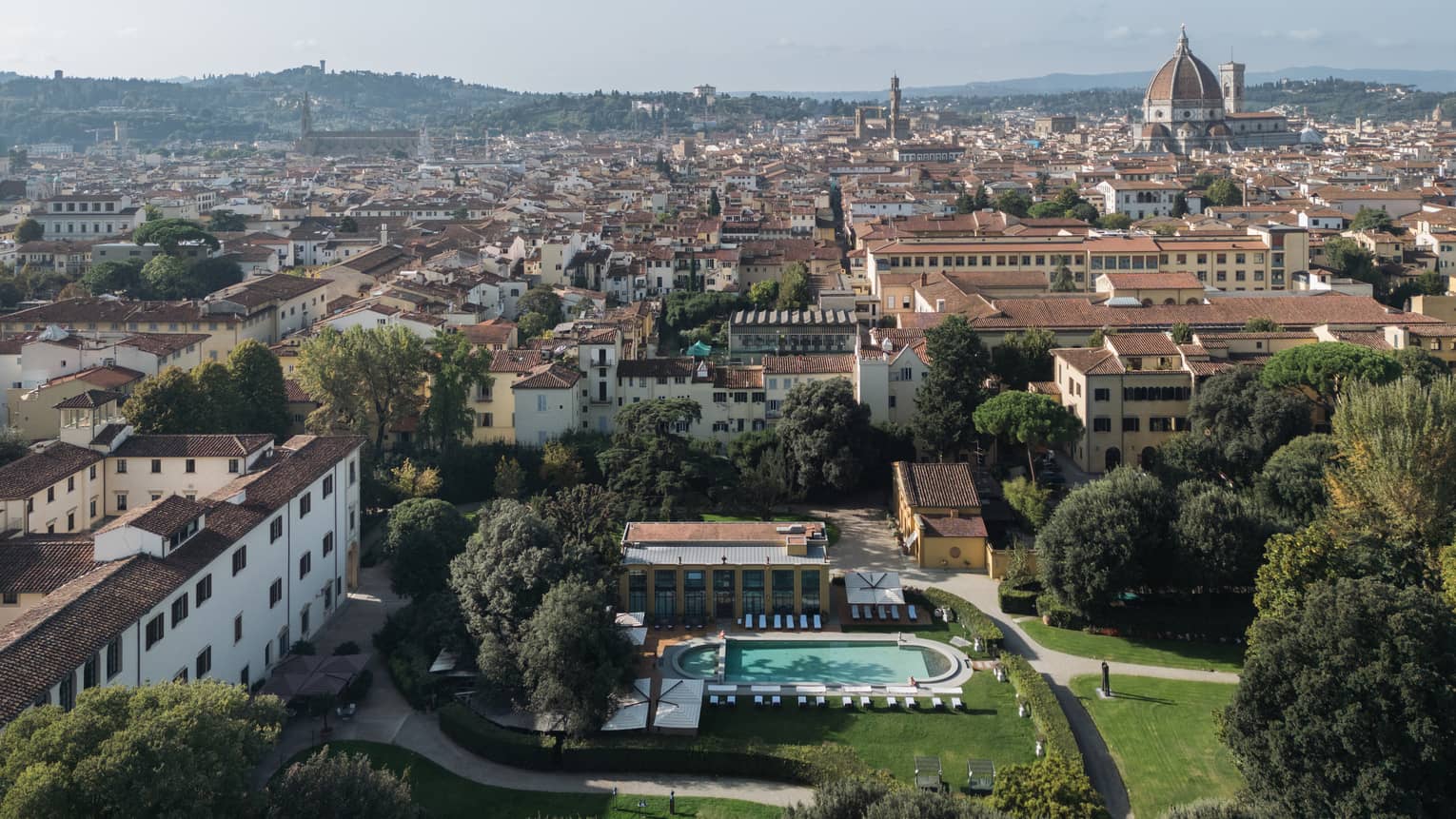 Aerial view of the property and surrounding area