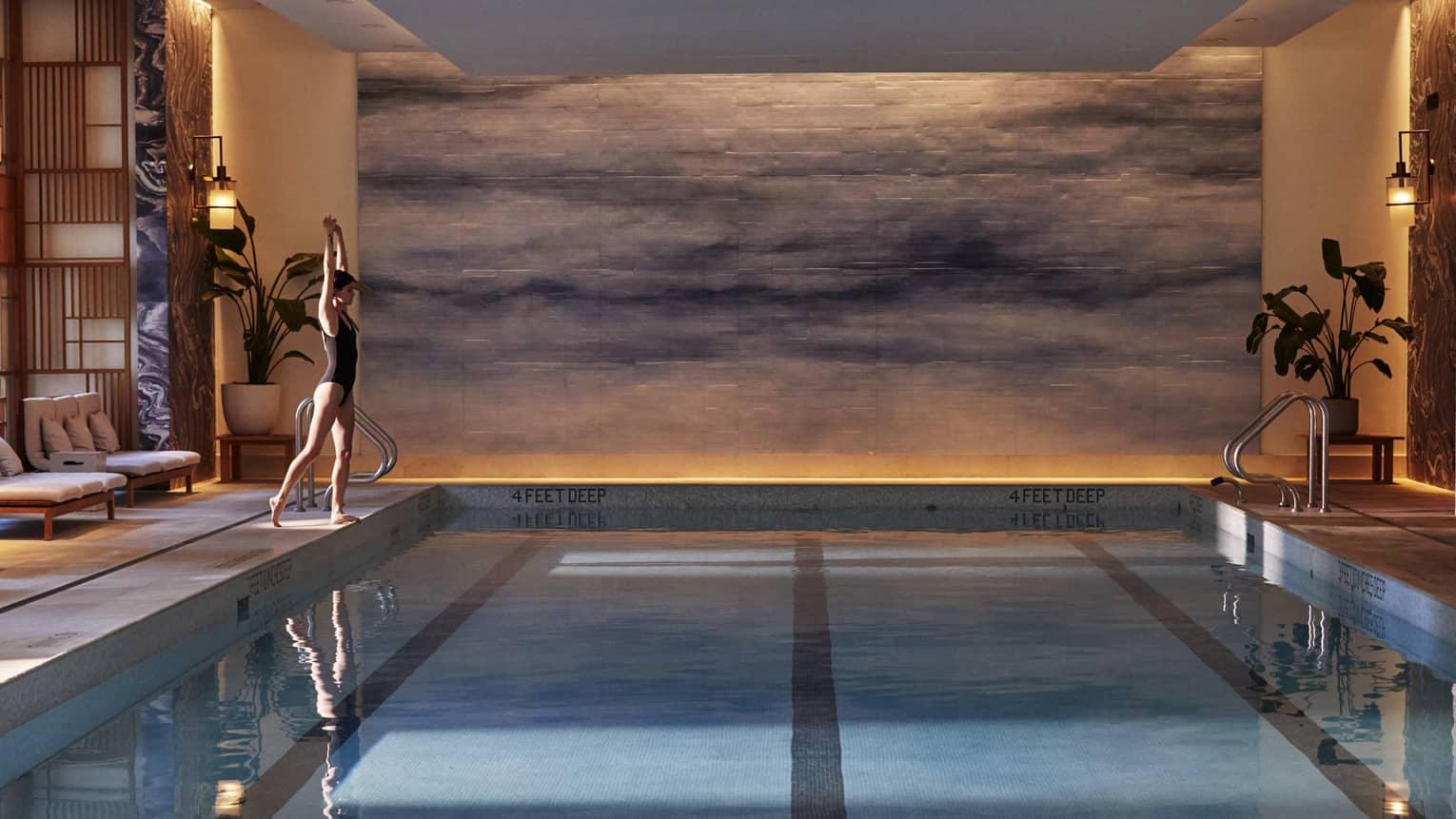 Guest getting ready to dive into the pool.