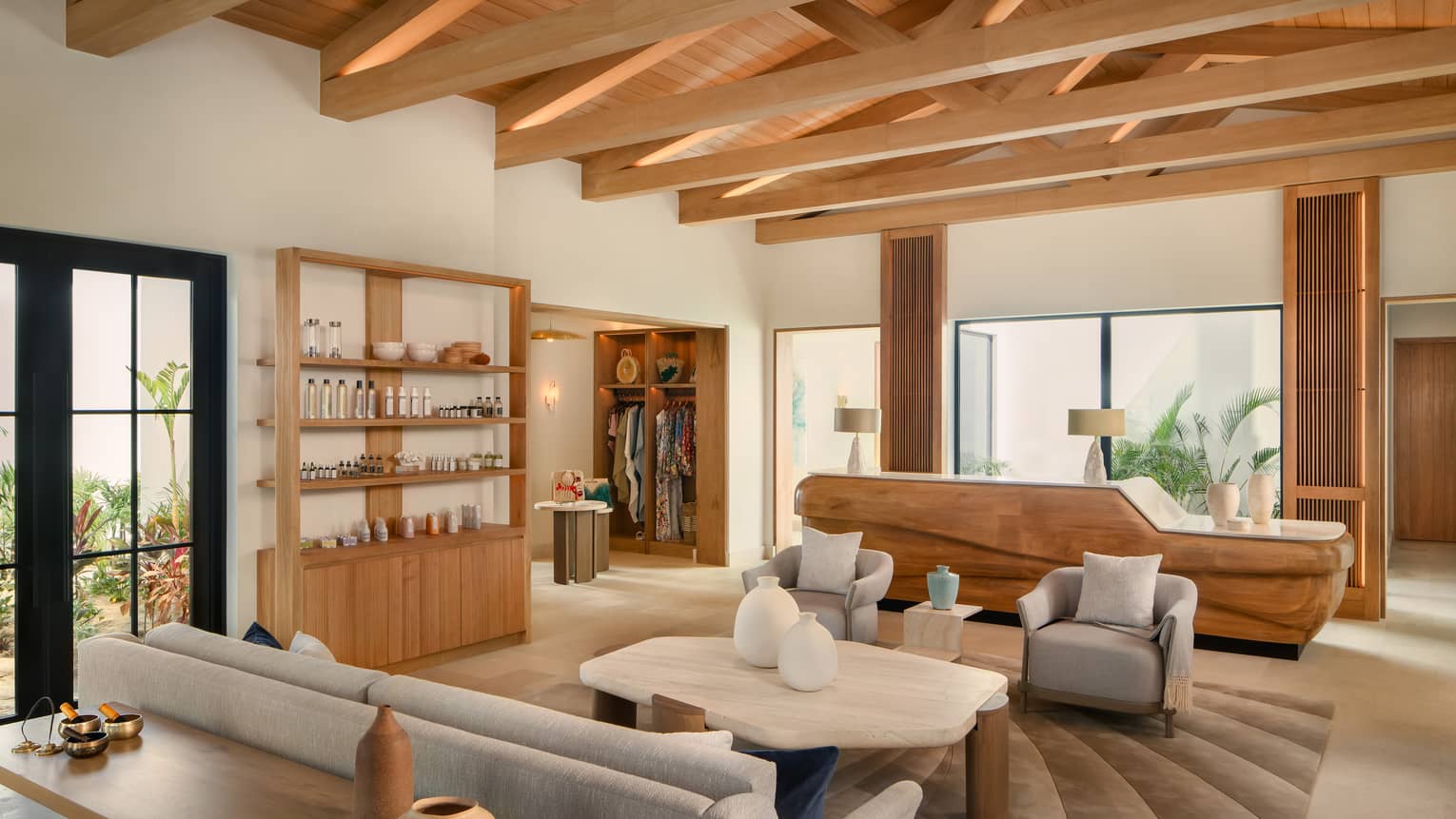 Luxury Tierra Mar Spa reception area at Four Seasons Resort Cabo San Lucas at Cabo Del Sol, with natural wood furnishings and beamed ceiling