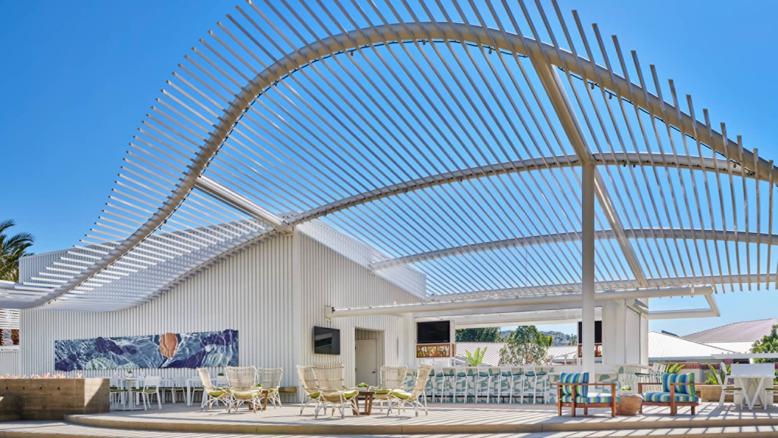 An outdoor sitting area under a blue sky.