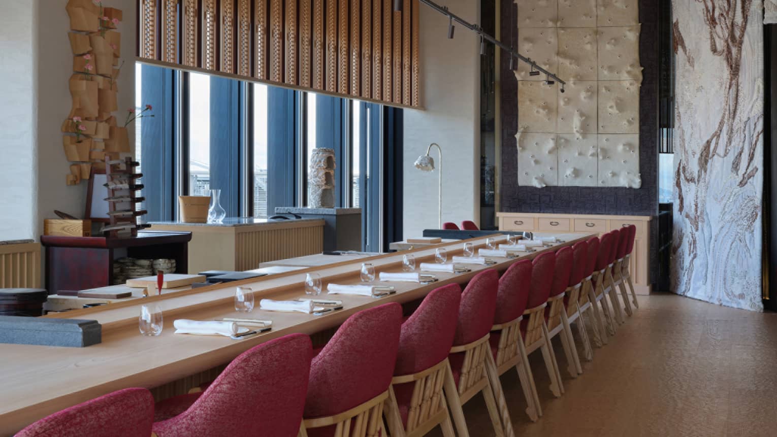 Sushi L’Abysse Osaka Yannick Alléno at Four Seasons Hotel Osaka, featuring an elegant sushi counter and modern Japanese decor.