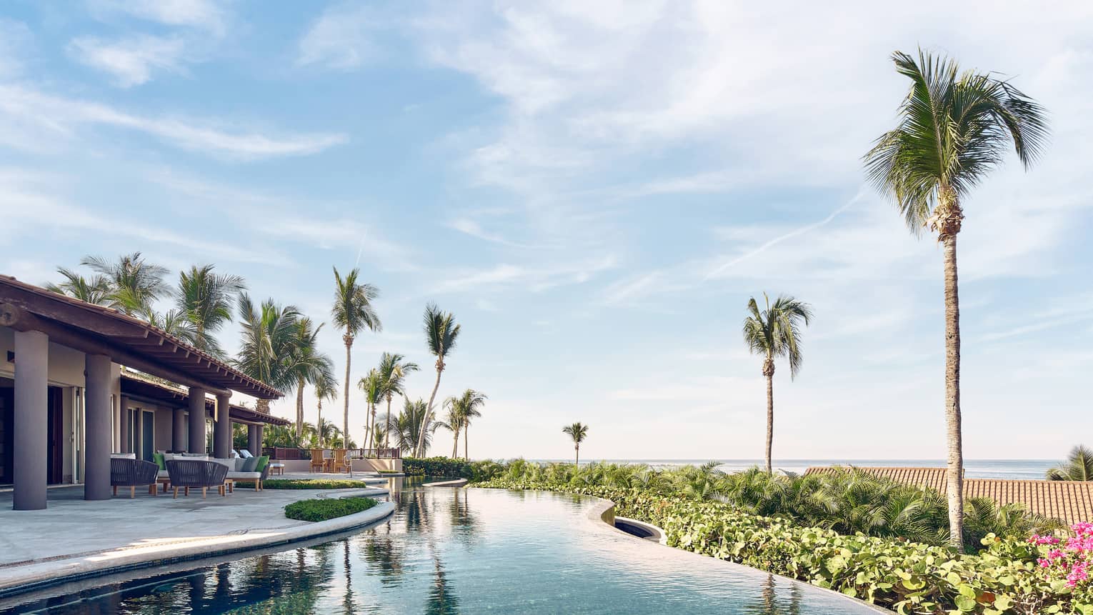 Luna Ocean Villa exterior with infinity edge pool