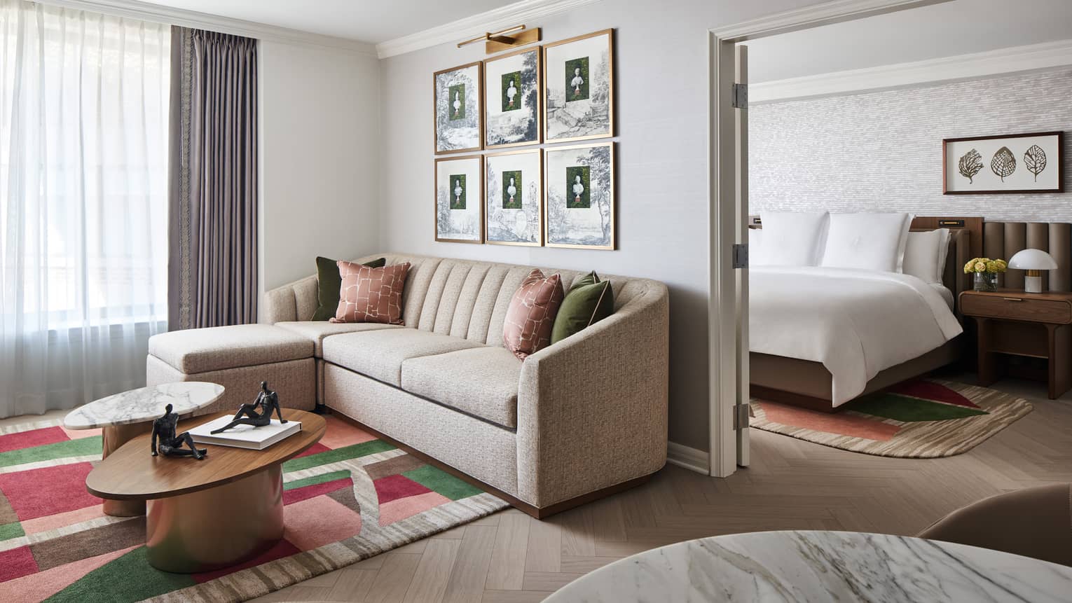 Living room and separate bedroom of Georgetown Suite at Four Seasons Hotel Washington, DC