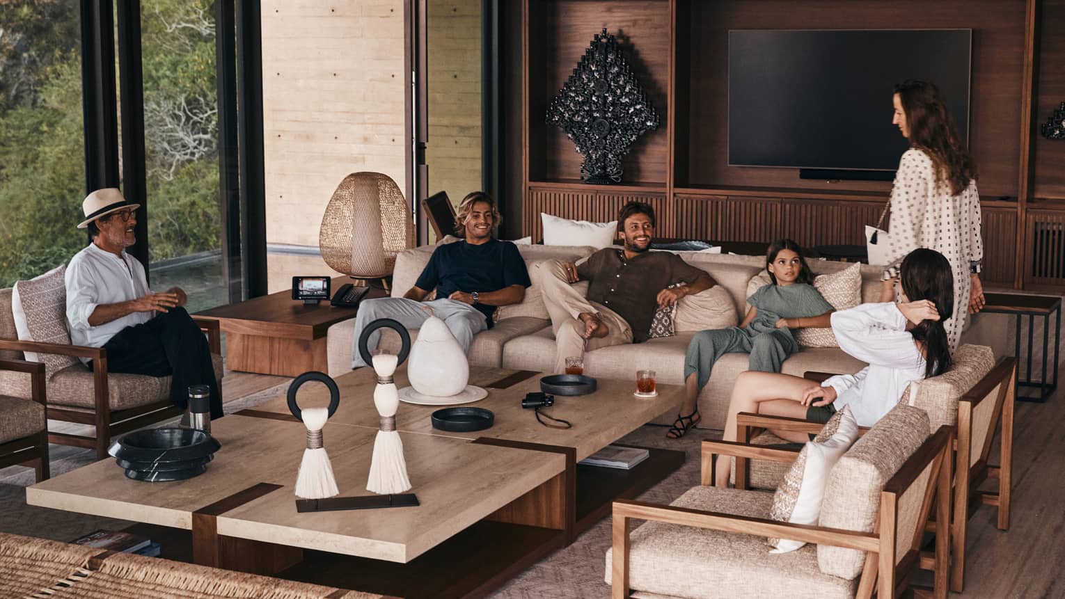 Family gathered in the rental living room