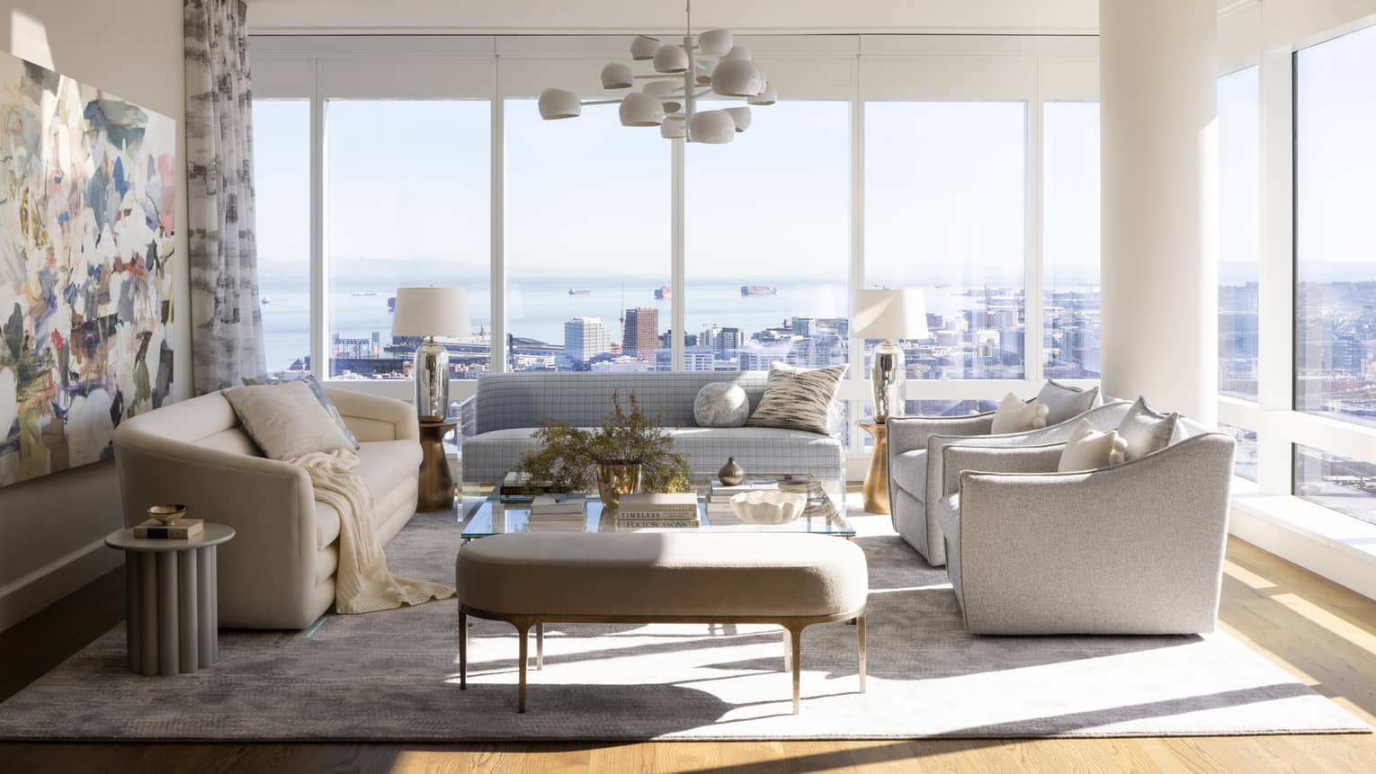 Interior of residence showing living room and floor-to-ceiling windows