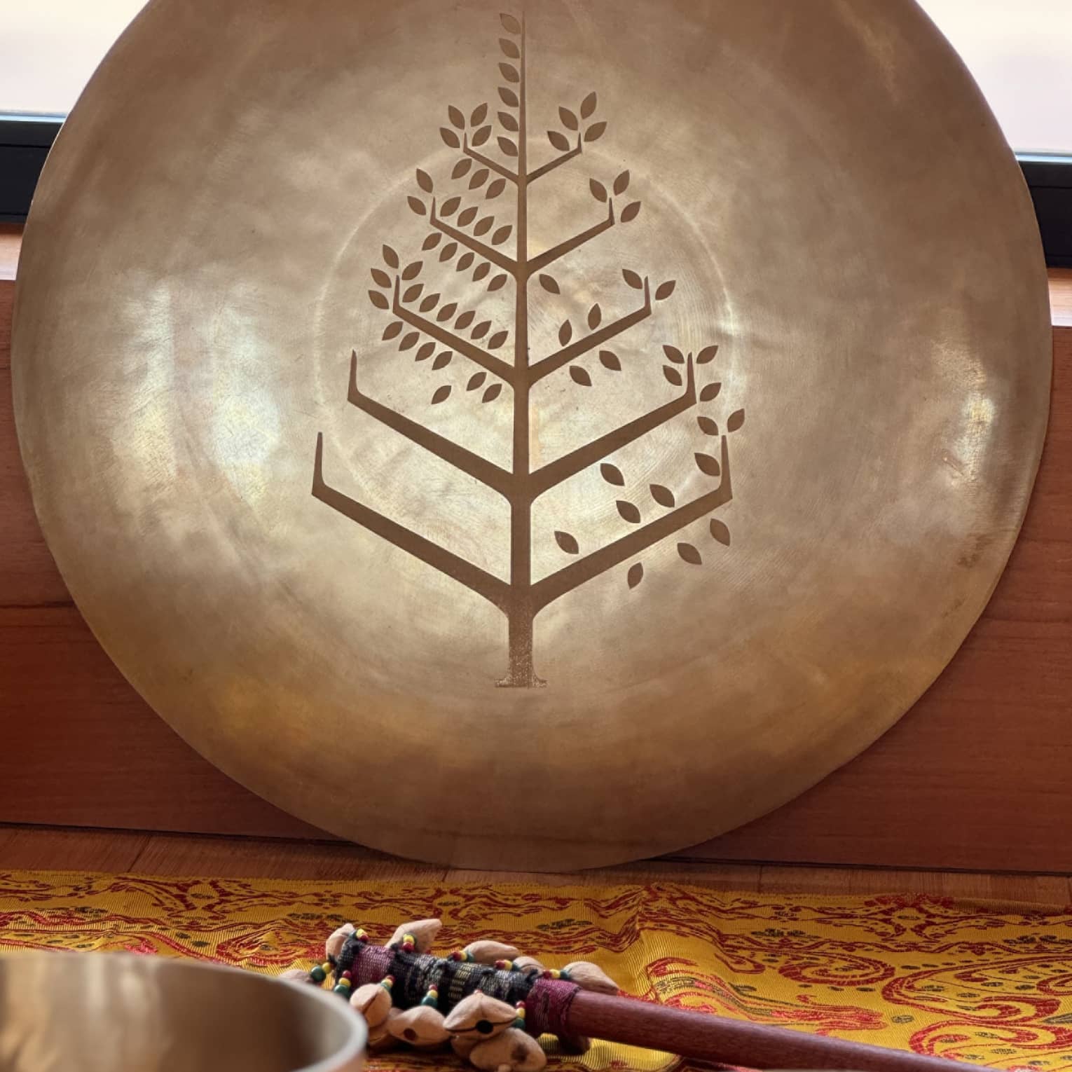 Gong with Four Seasons tree logo engraved in the centre