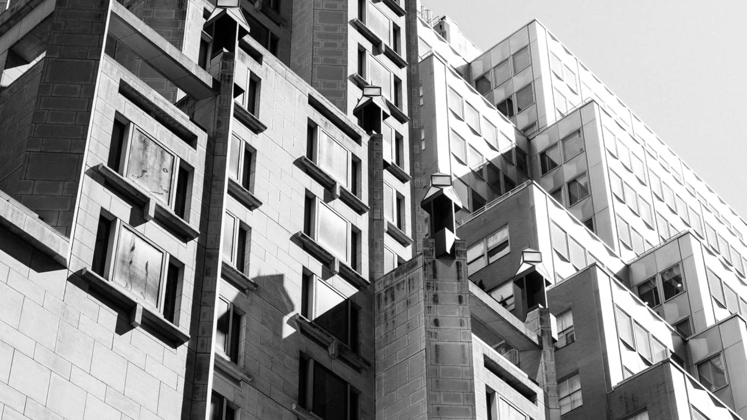 A large building with many dimensions and windows.