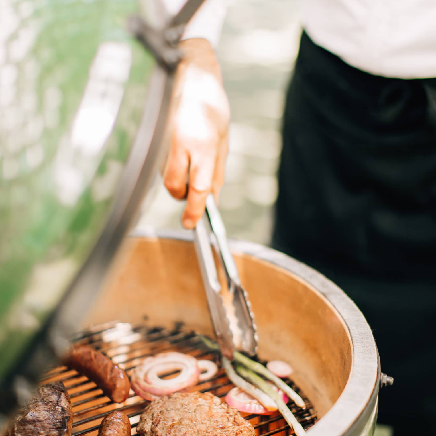 Food being grilled outside.