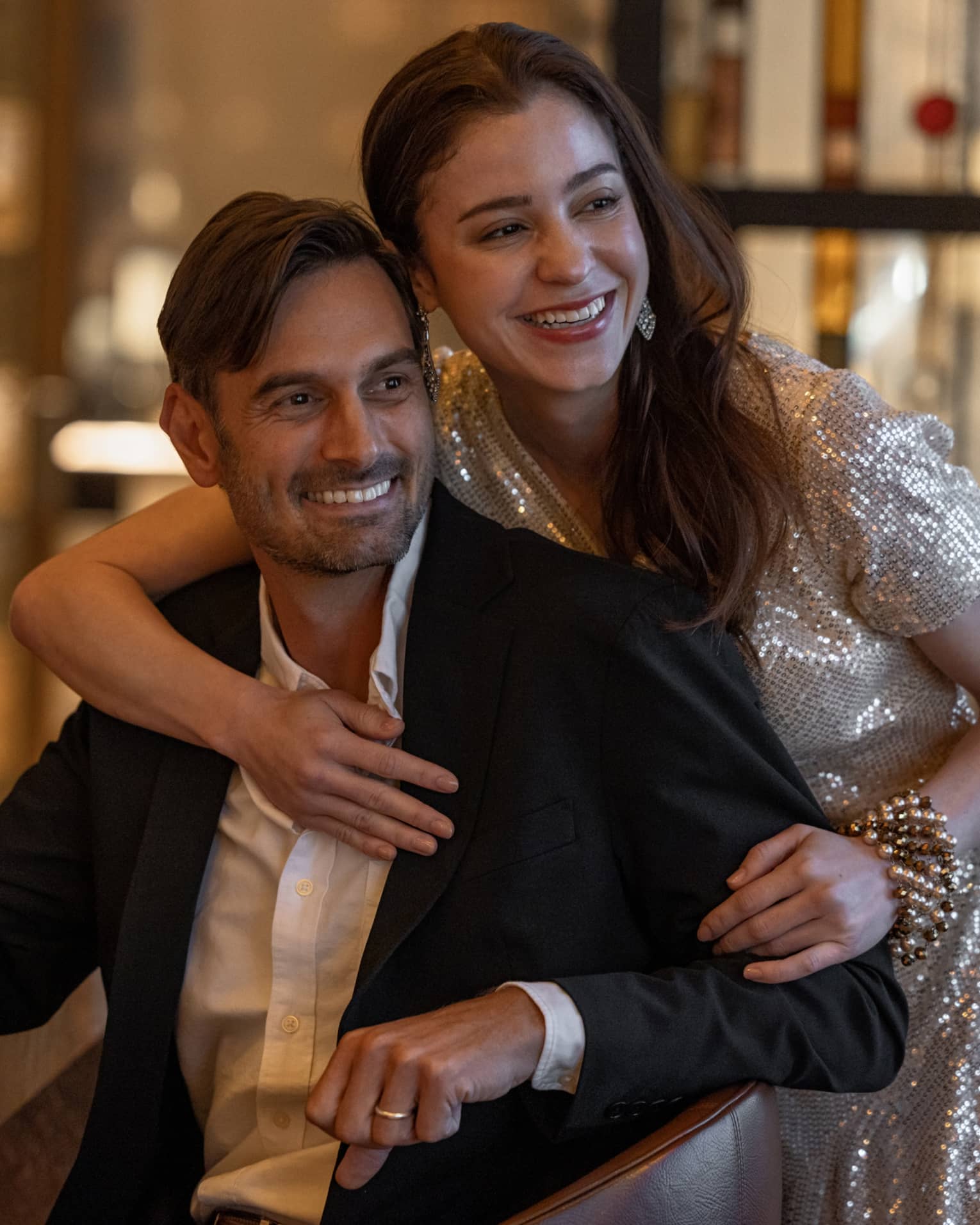Smiling couple enjoying a Christmas celebration in Tokyo