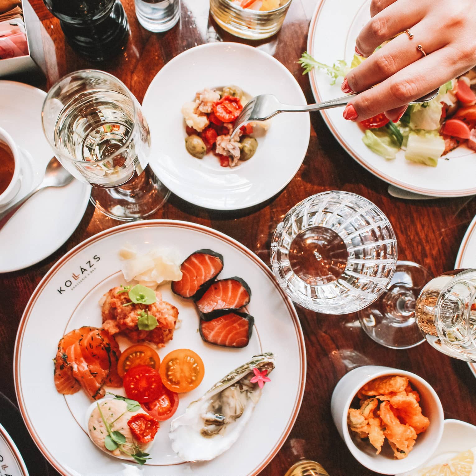 Table full of brunch dishes and glassware