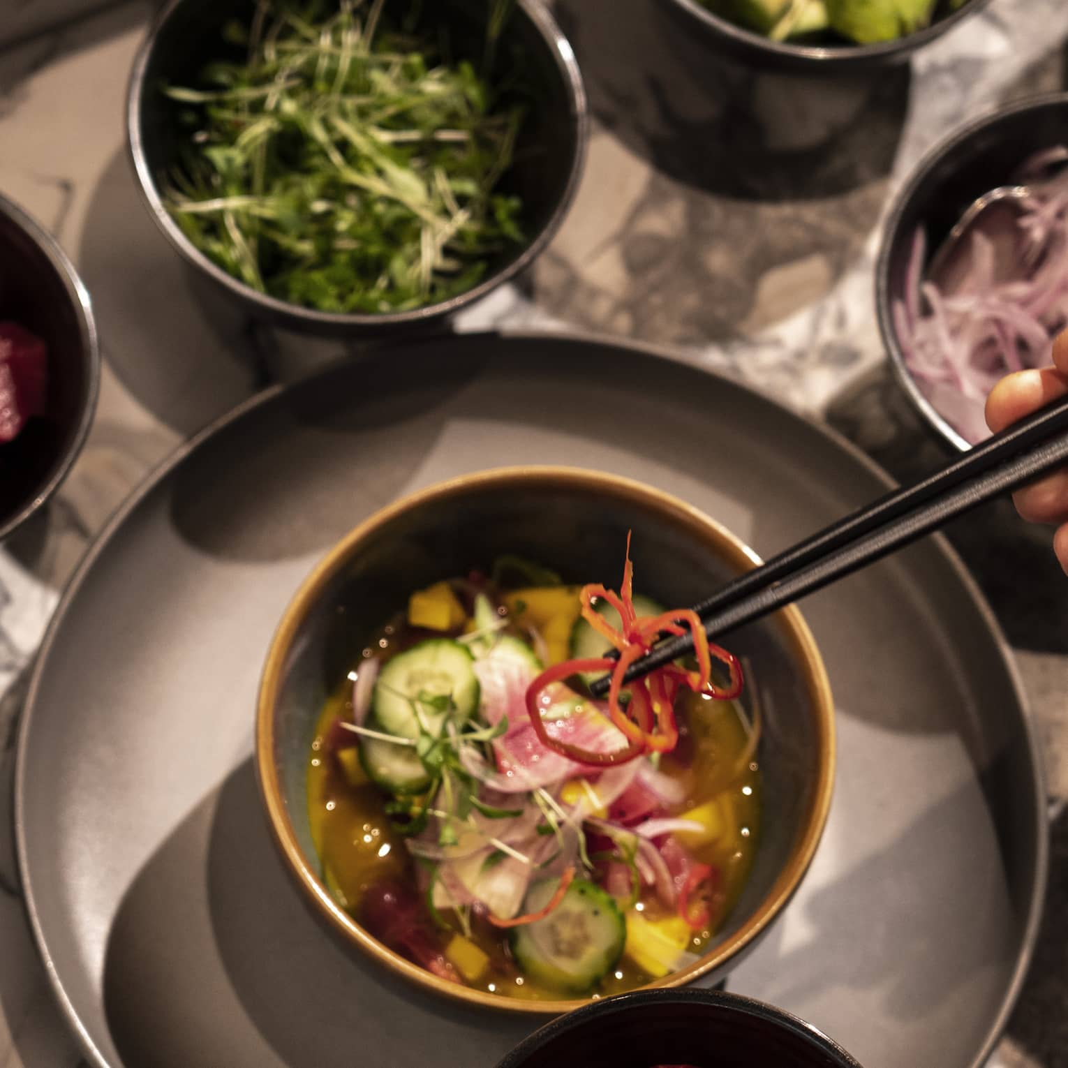 An assortment of ingredients for a salad.