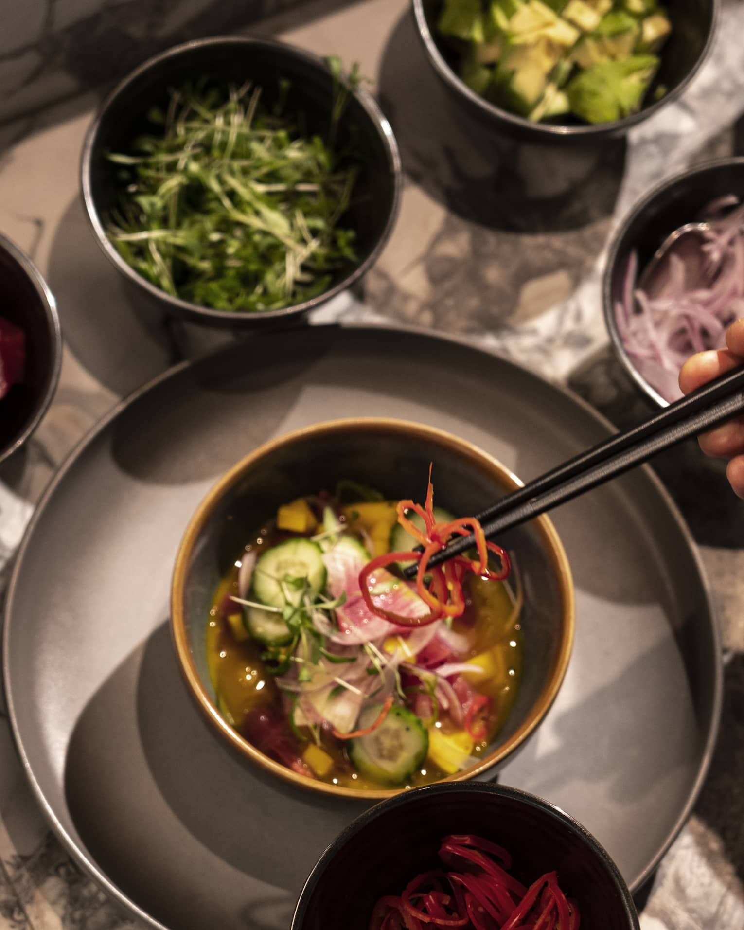 An assortment of ingredients for a salad.