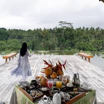 Woman on decking overlooking Ayung River Valley