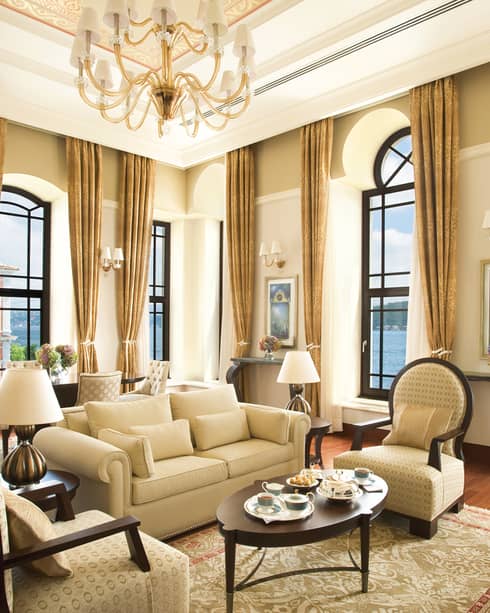 Two-Bedroom Bosphorus Palace Suite elegant seating area, ivory curtains on corner windows