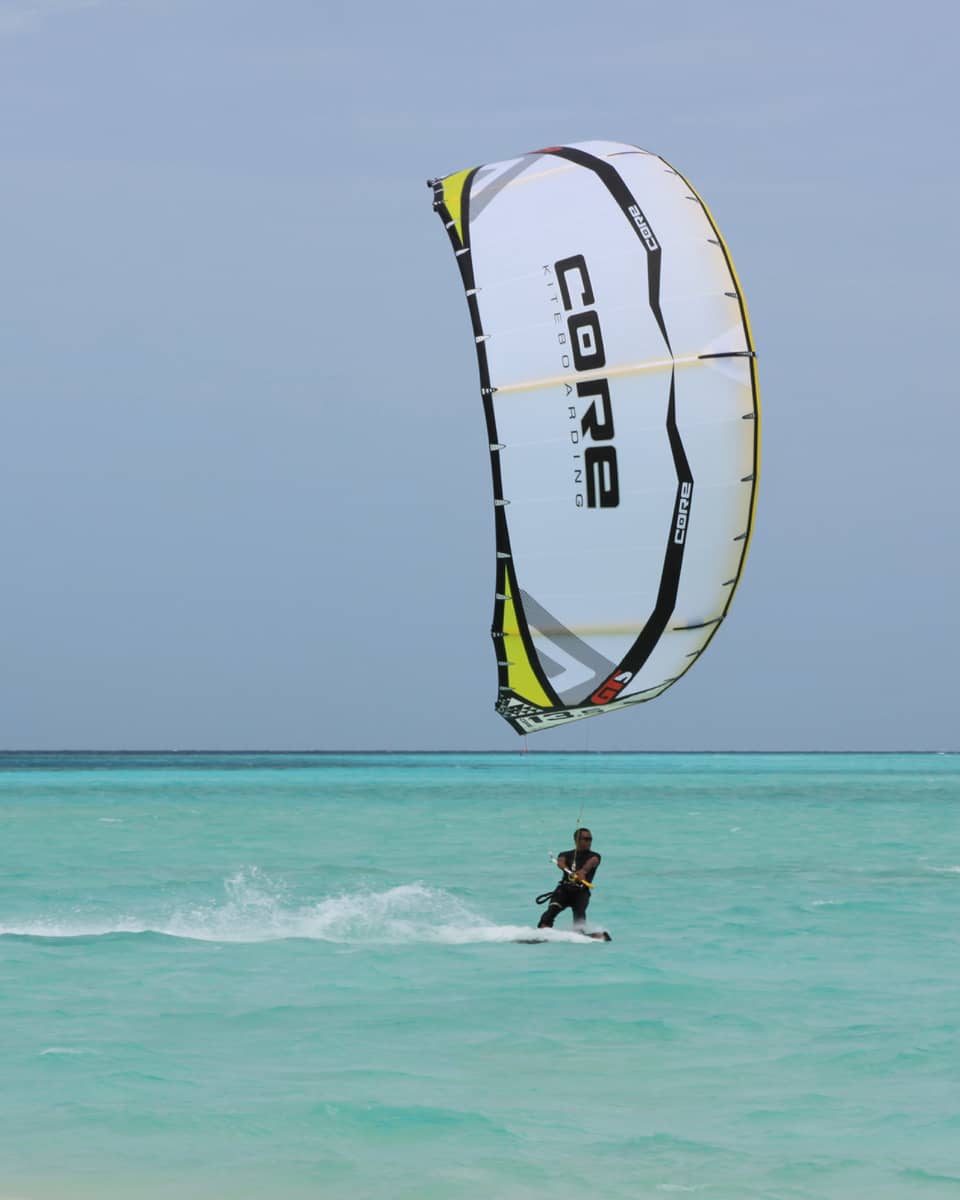 Windsurfer on blue ocean