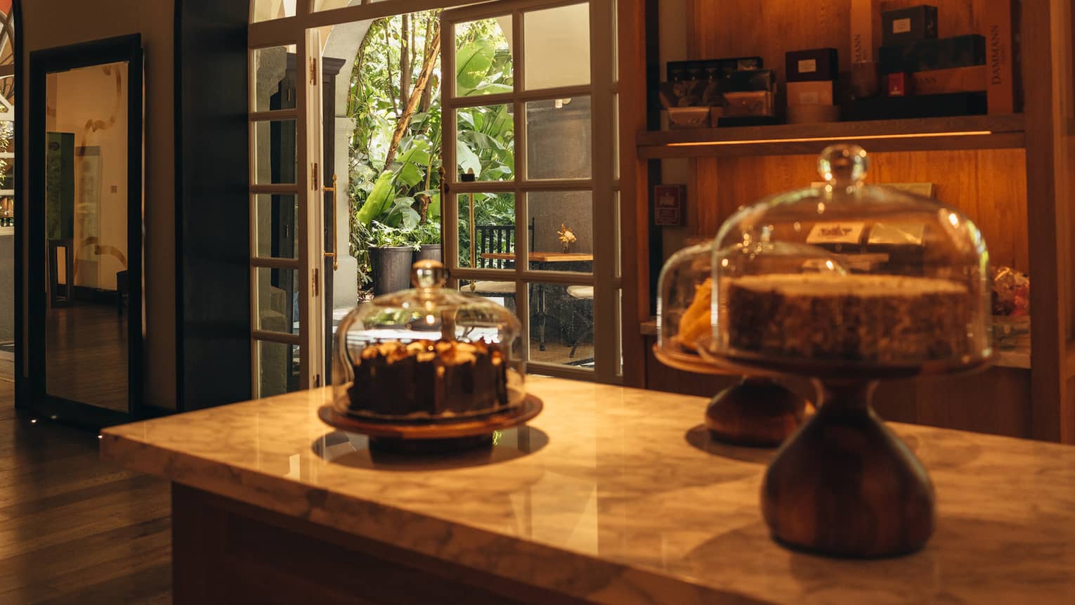 Pan Dulce kitchen with island with three desserts on it.