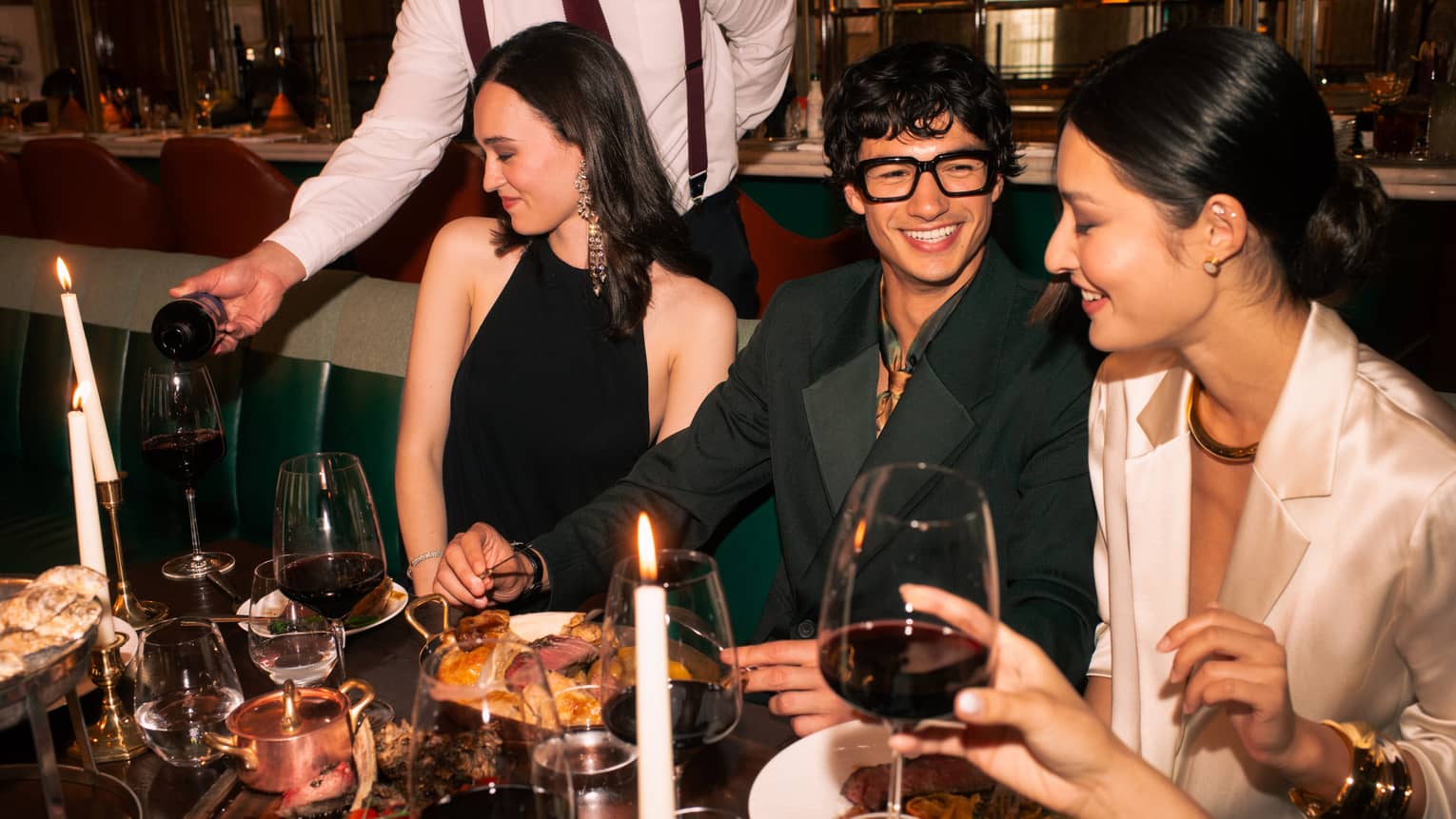 Group of friends dine at chic restaurant