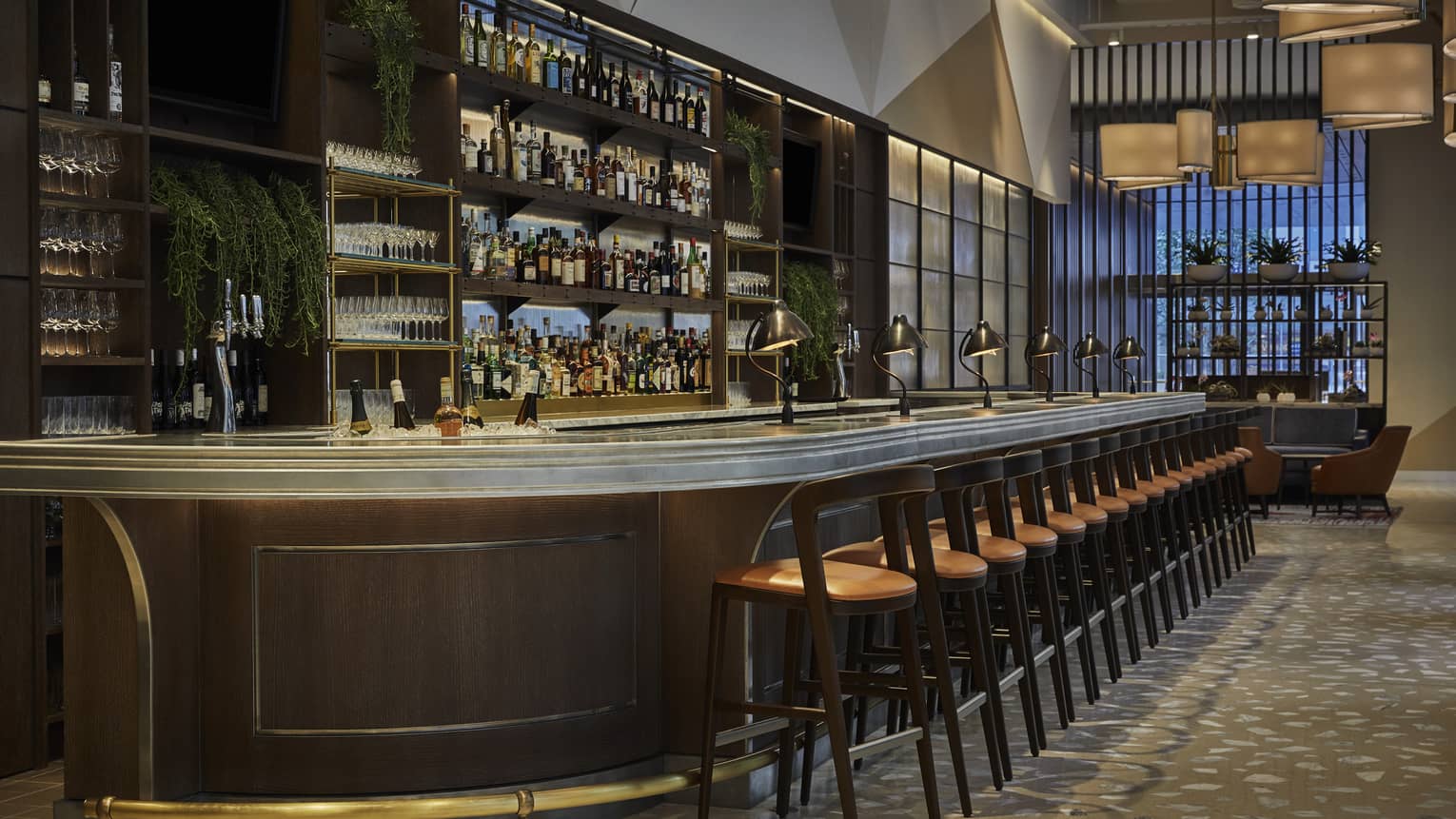 A side view of the curved bar at Vernick Restaurant in Four Seasons Philadelphia