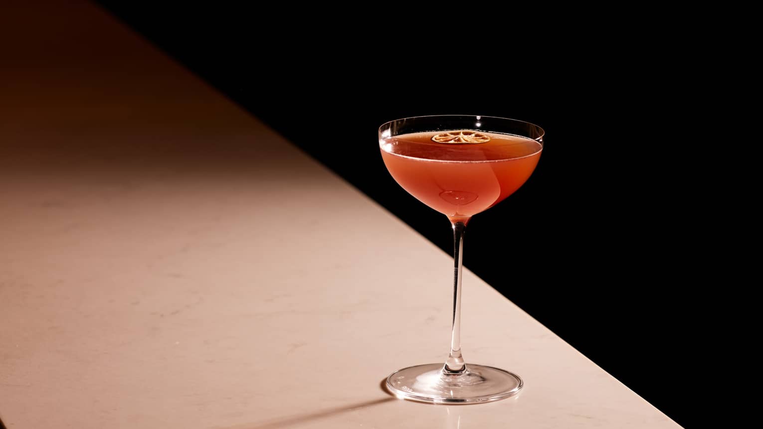 A light red cocktail.