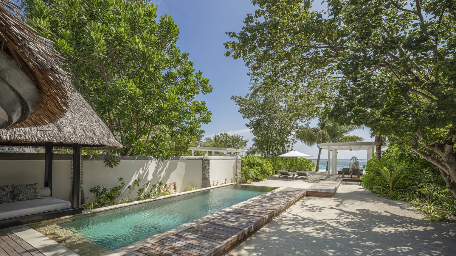 Rectangular pool of a private villa at luxury tropical resort