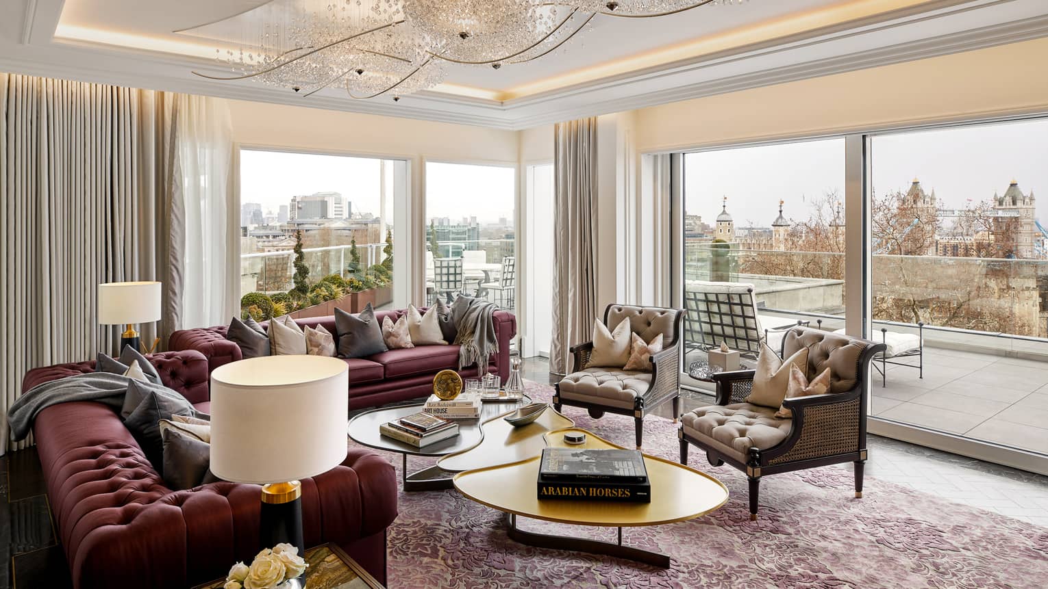 Residence living area and terrace, with views of Tower Bridge through the window