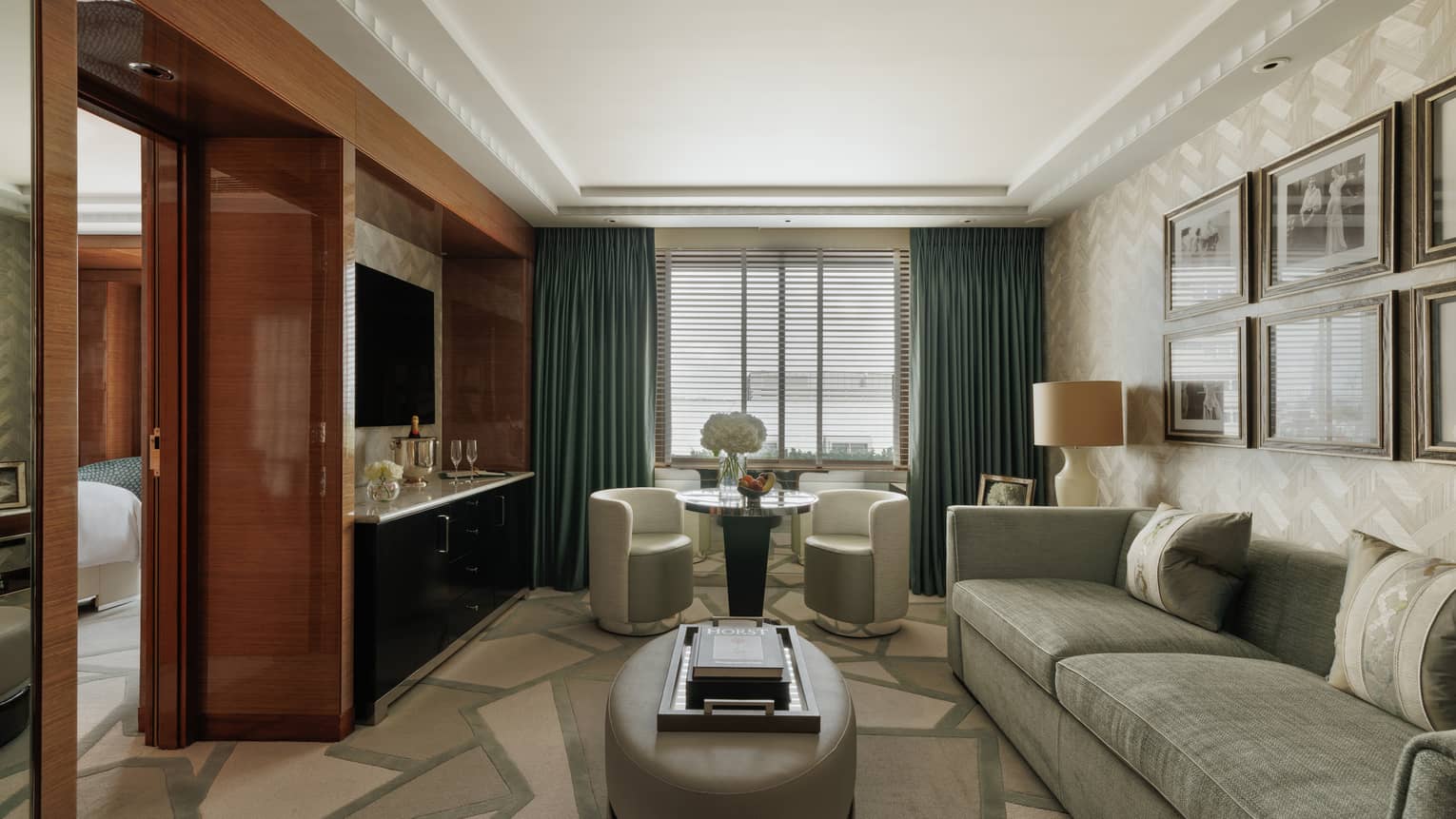 Luxury hotel suite living room and separate bedroom at Four Seasons Hotel London at Park Lane