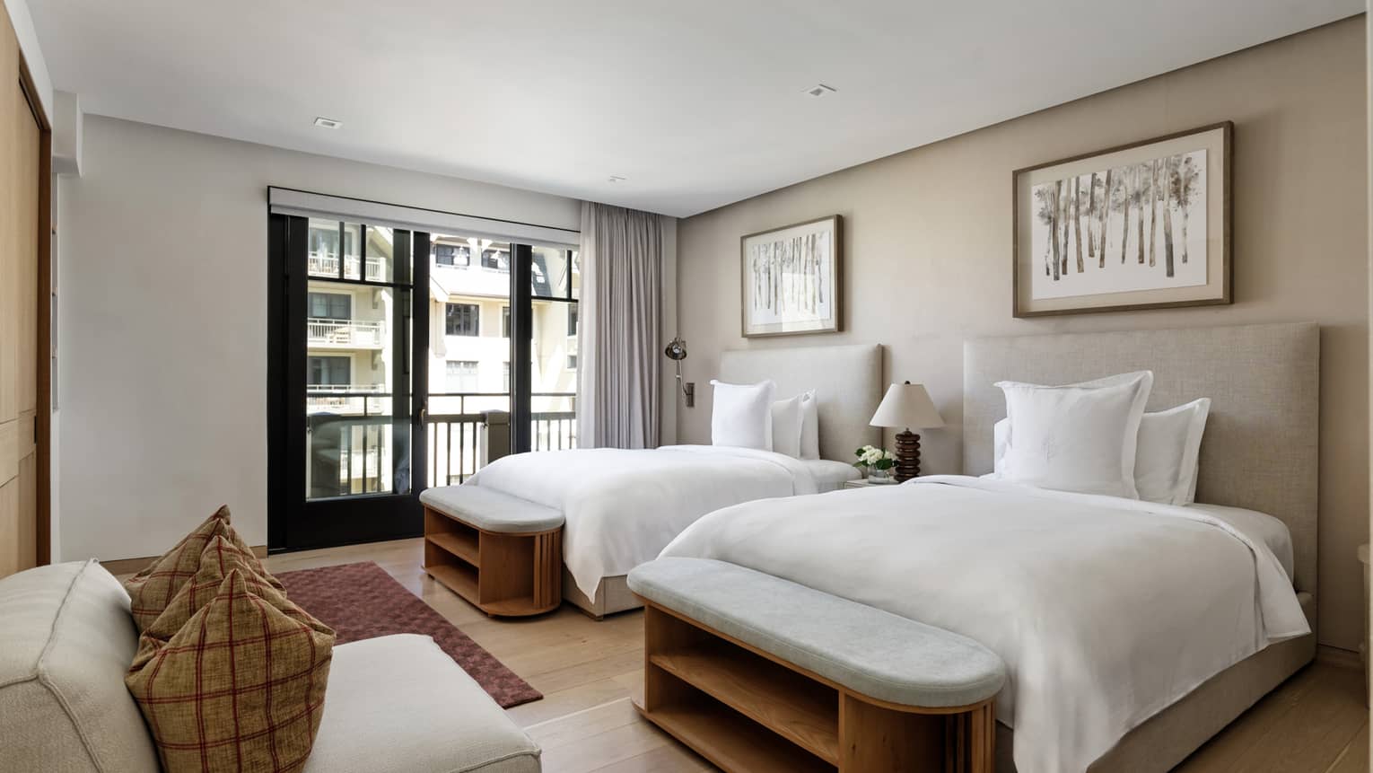 Sleek bedroom with two queen beds in a luxury residence at Four Seasons Vail