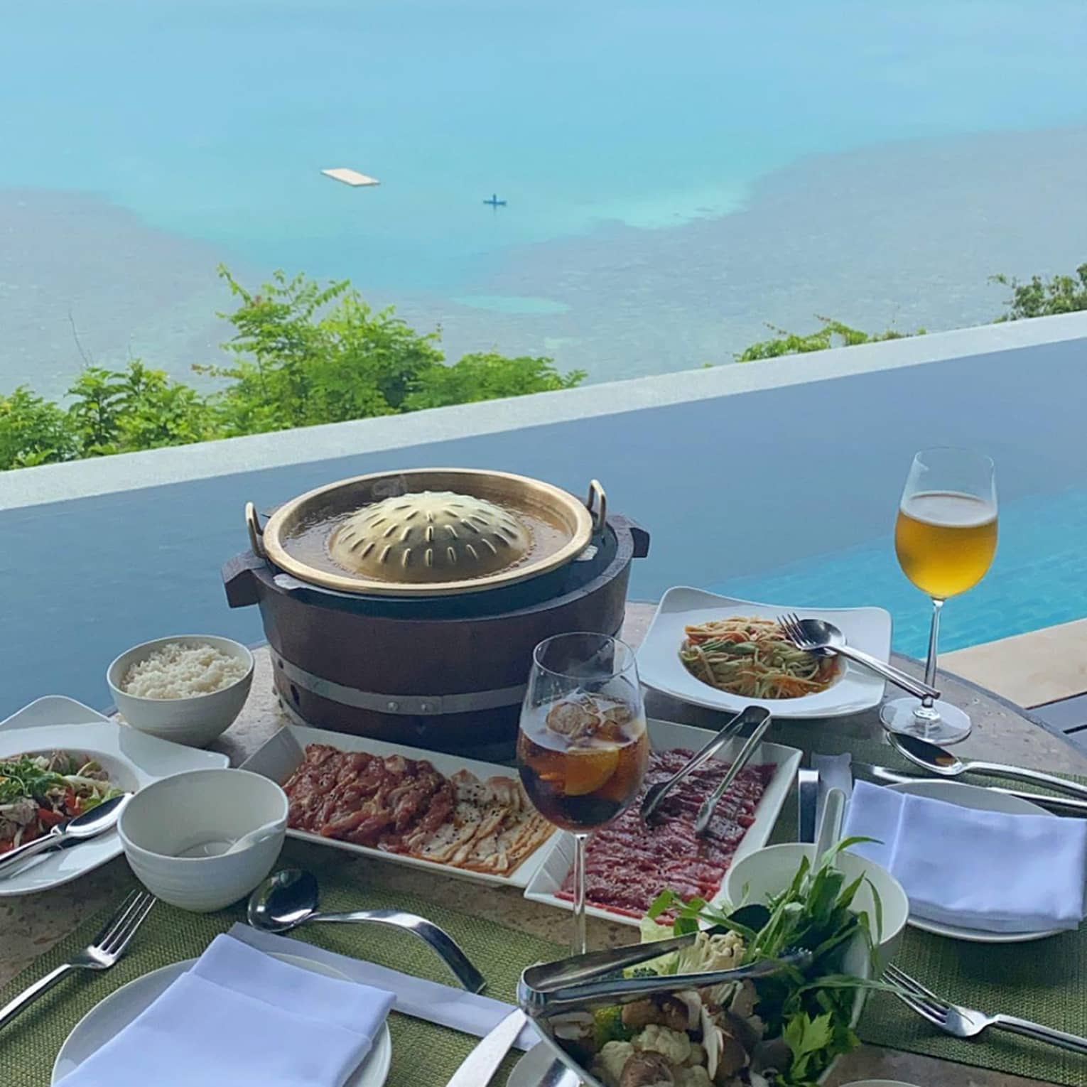 Poolside dining with an ocean view