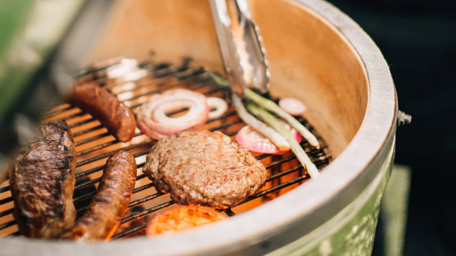 Food being grilled outside.