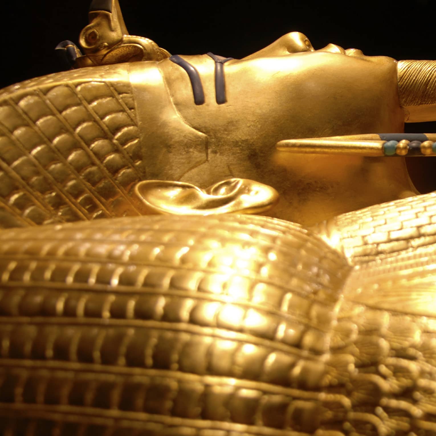 Side view of gold Pharaoh King Tutankhamun tomb in Cairo Egyptian Museum
