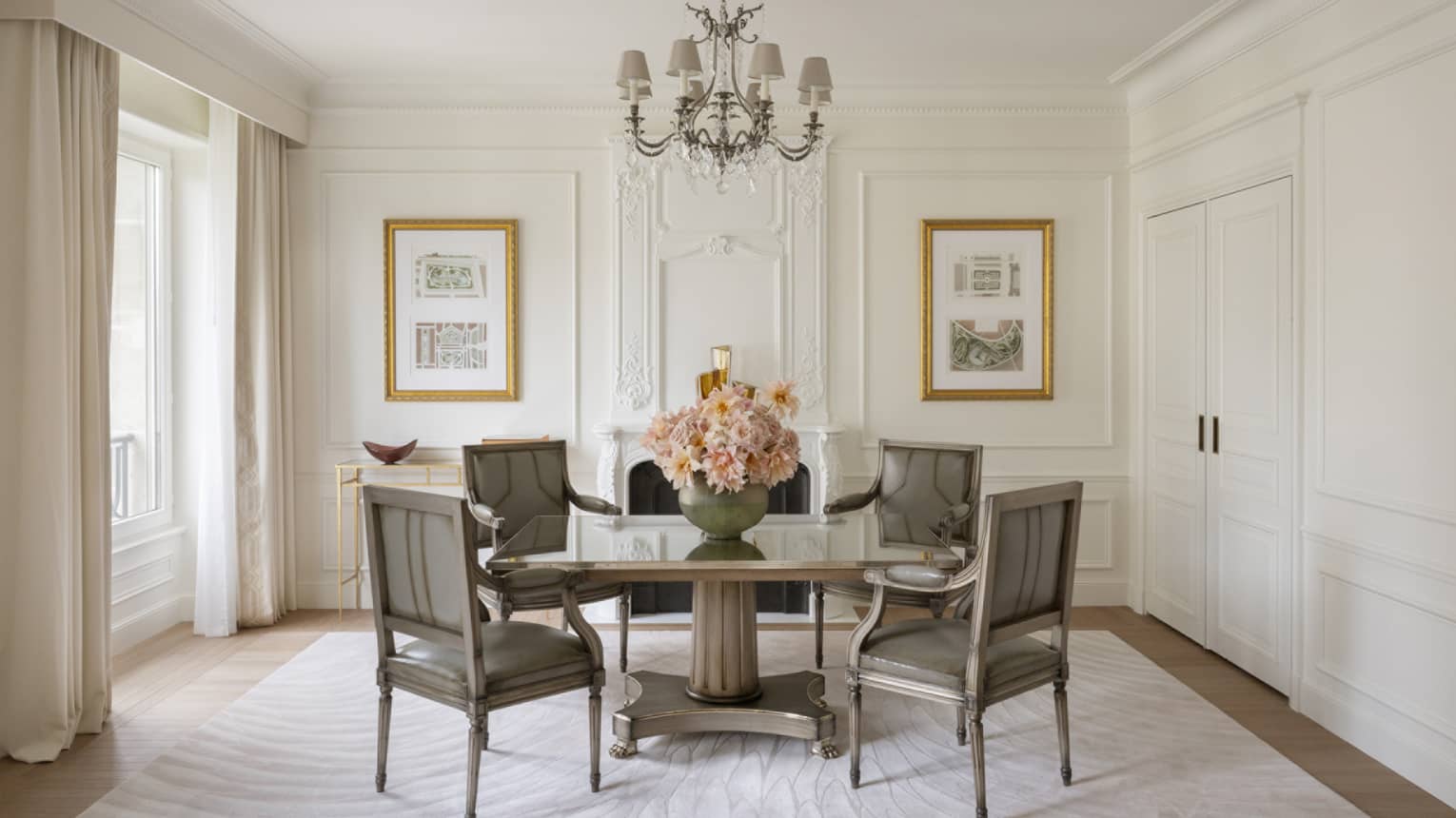 Sitting room with square table, four chairs, centrepiece flower arrangement, chandelier ? Grand Premier Suite at Four Seasons Hotel George V, Paris