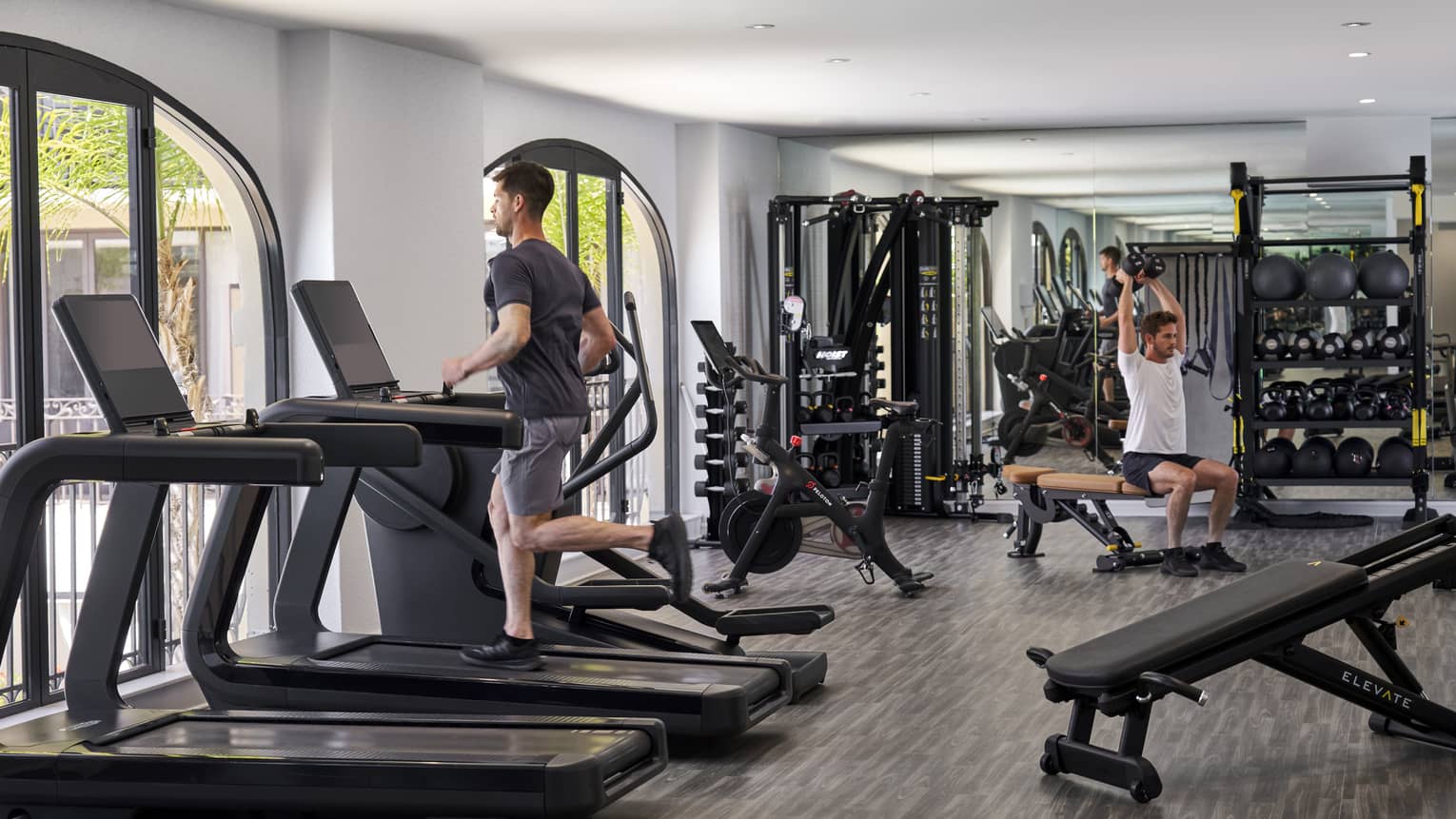 People exercising in a fitness centre.