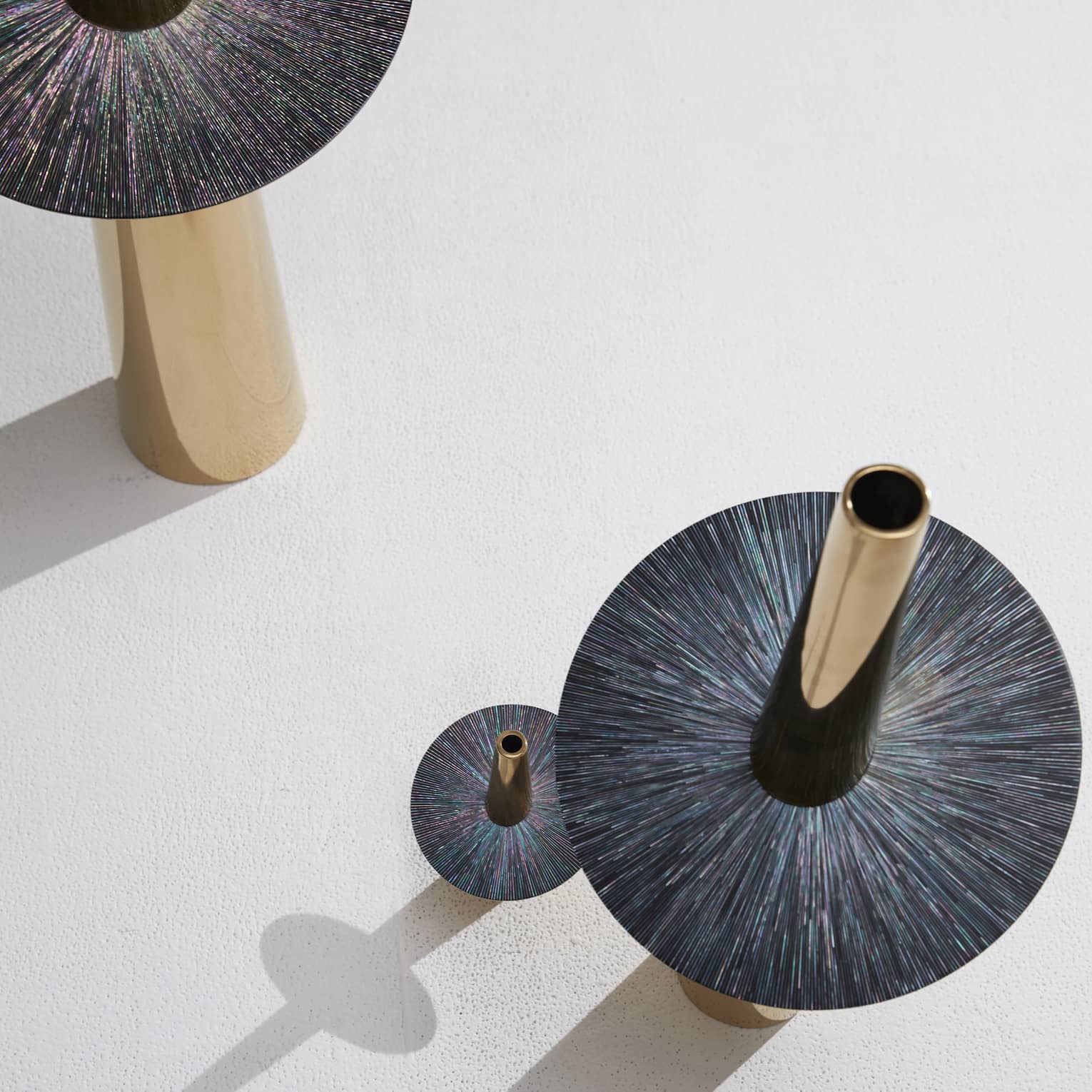 Circular artwork with a kaleidoscope of colours.