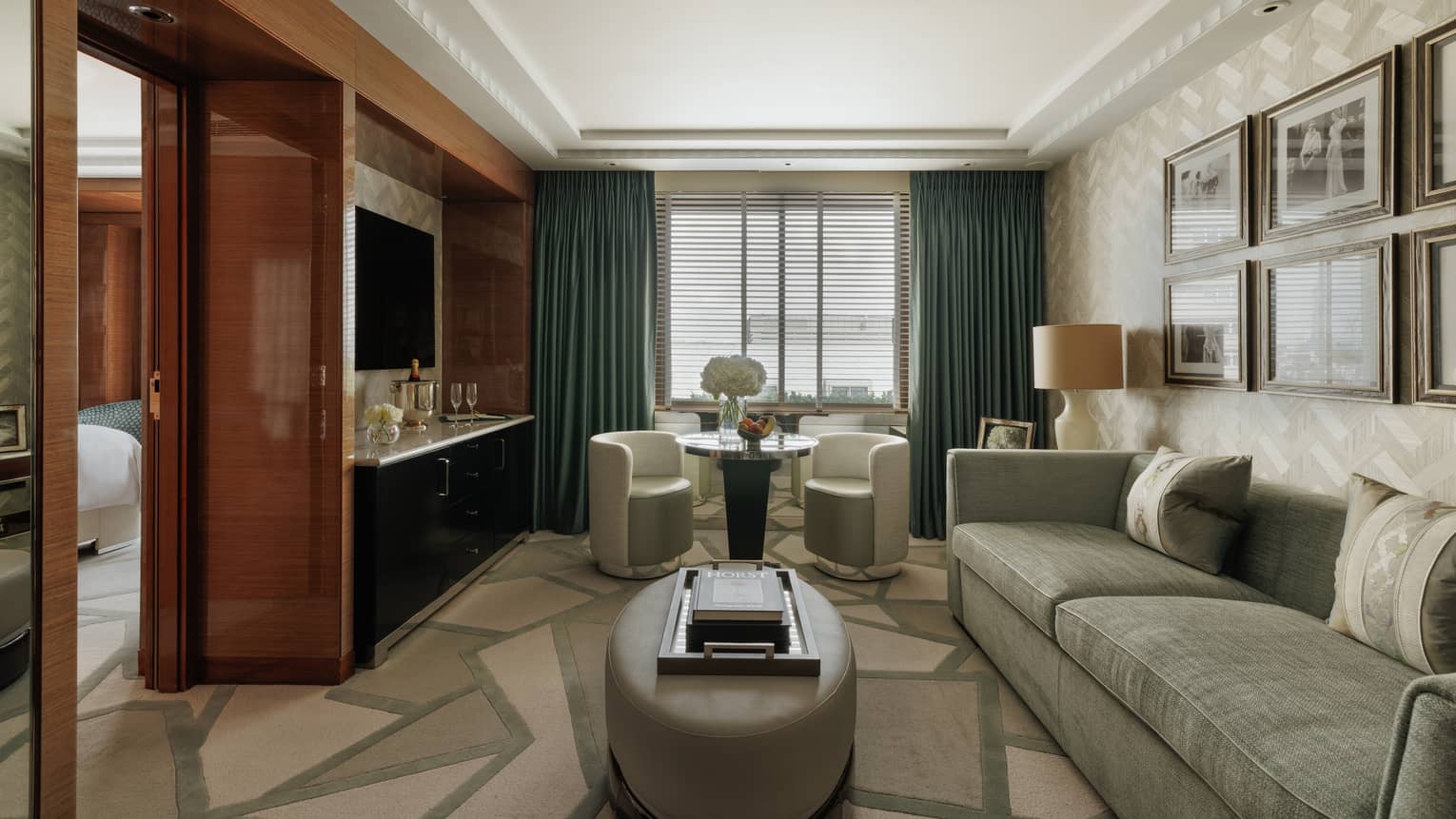 Luxury hotel suite living room and separate bedroom at Four Seasons Hotel London at Park Lane