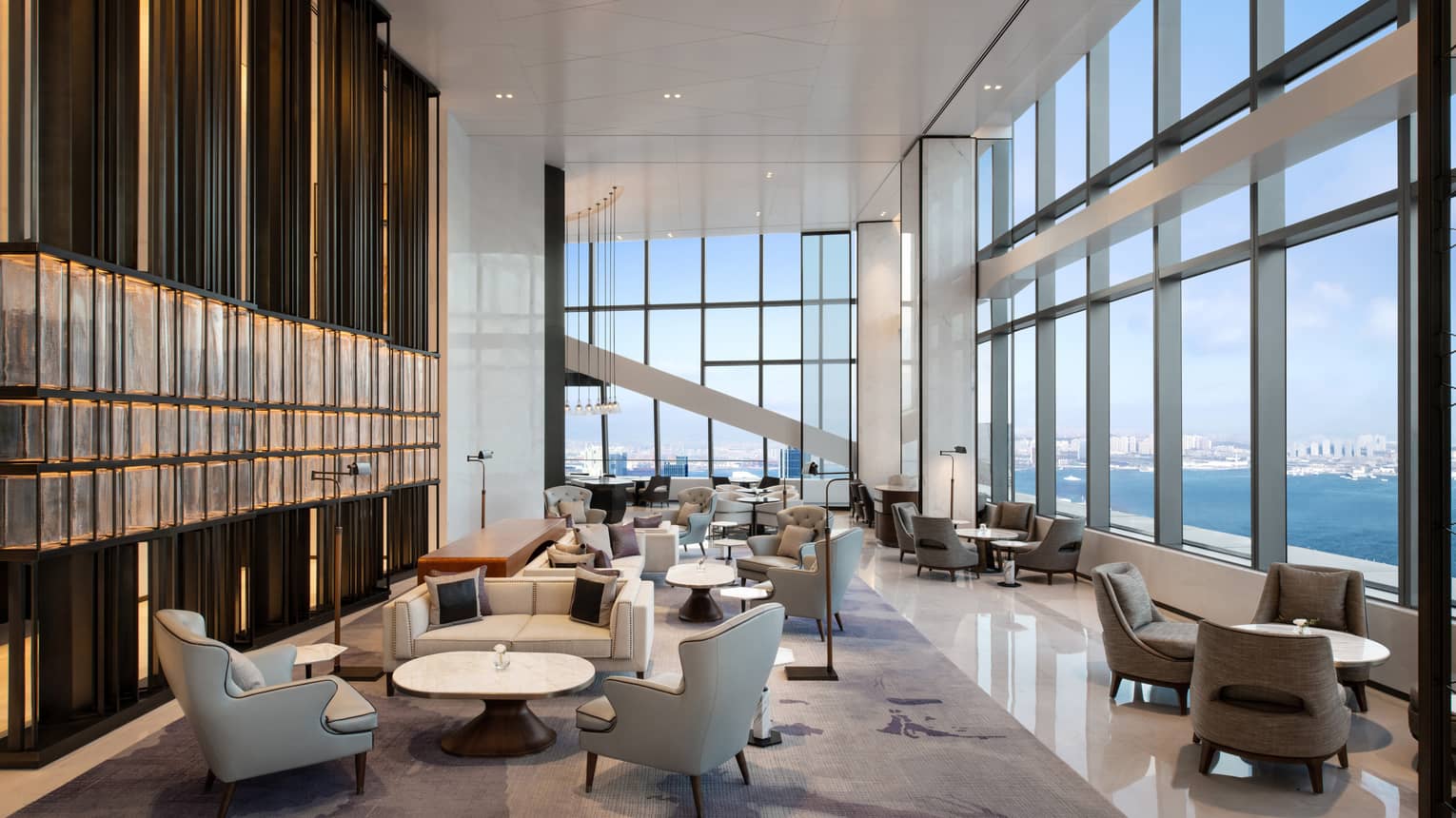 Hotel lounge with water view at Four Seasons Hotel Dalian