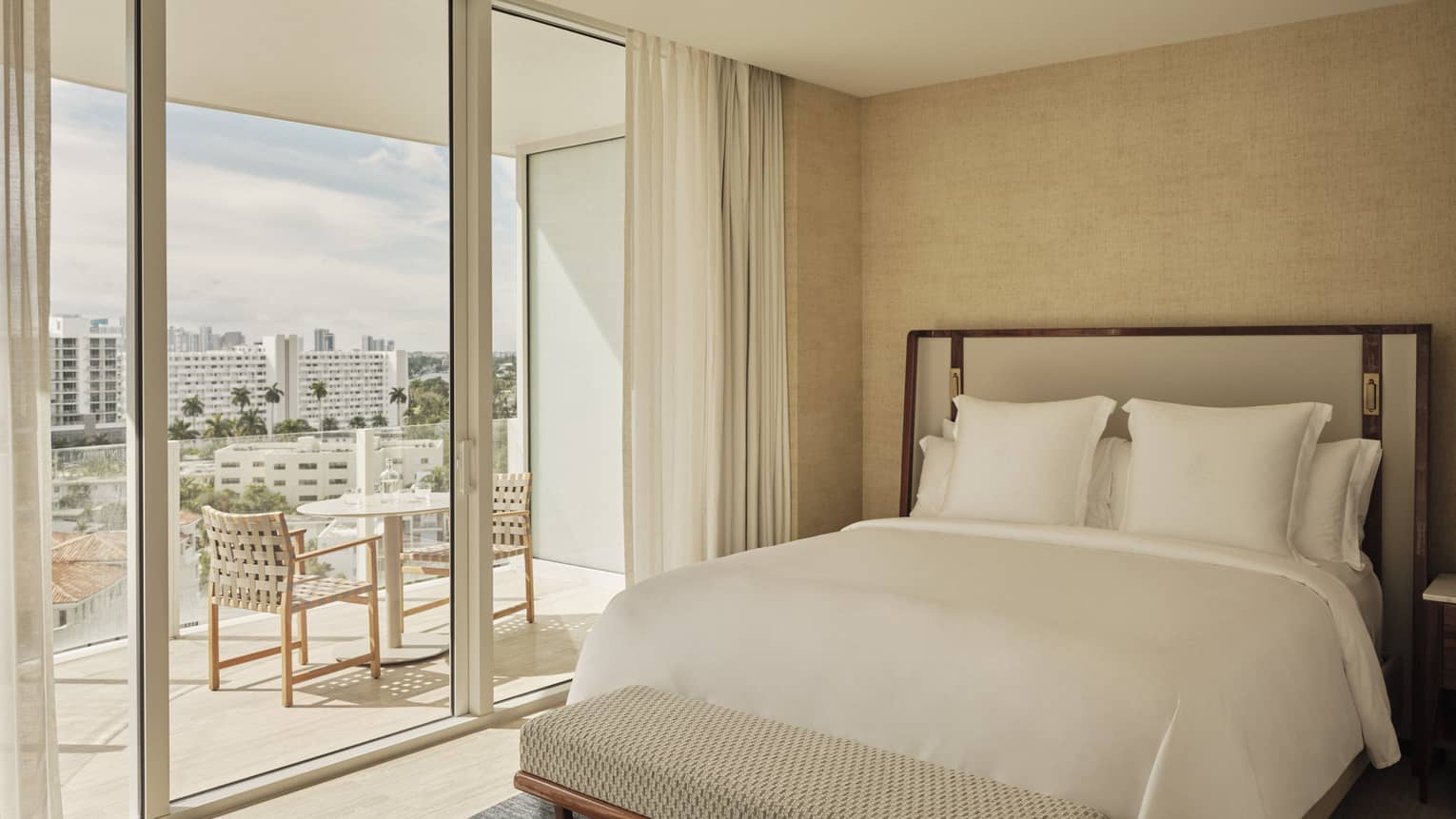 Bedroom with glass doors to balcony