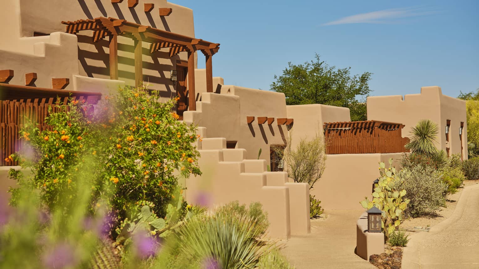 Exterior of a stucco resort entrance