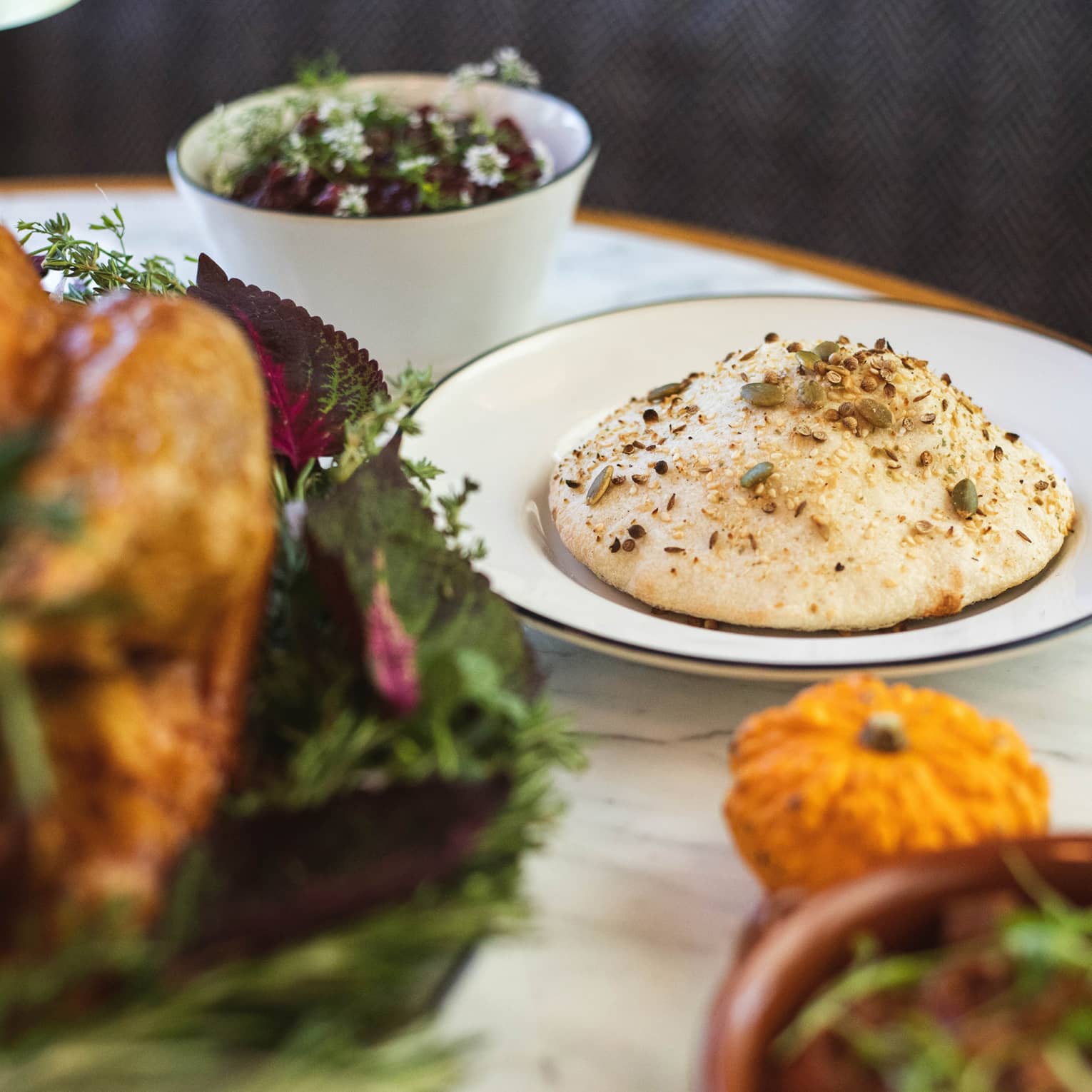 An assortment of thanksgiving food, including turkey, mashed pototoes, and more.