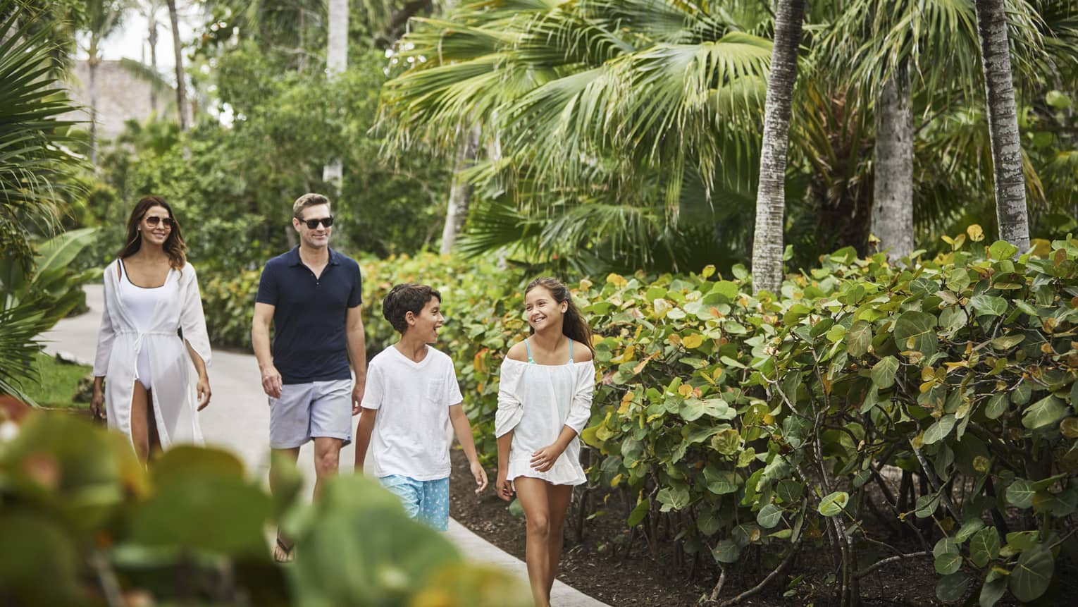 Family walking in greenly serenity