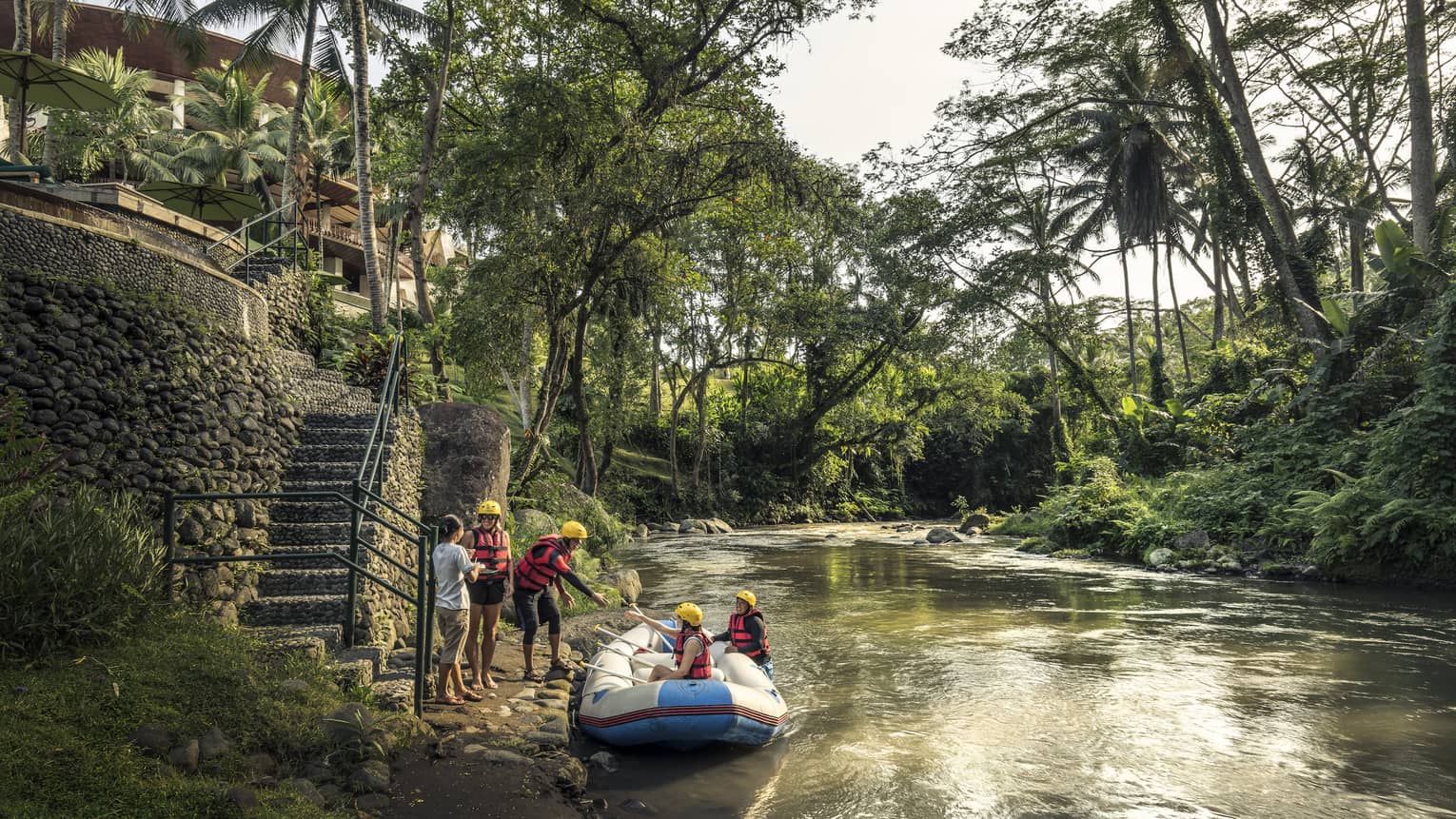 Guests disembarking from a raft after a river adventure in Bali