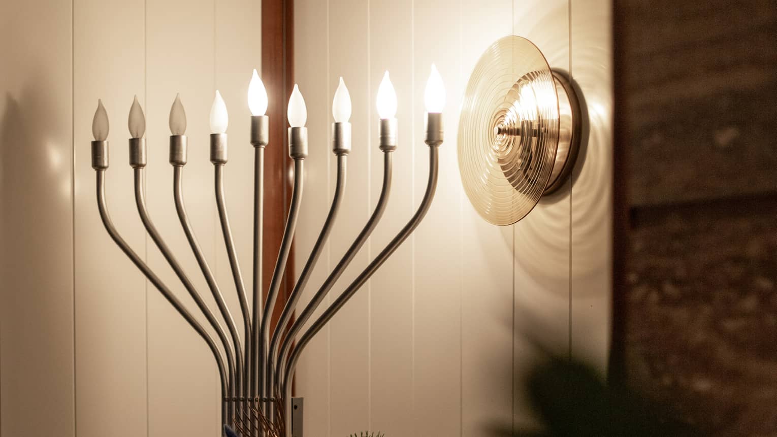 A menorah in a dimly lit room.