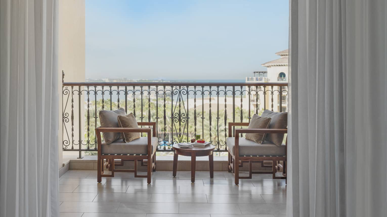 Private terrace of a hotel suite, looking out to the sea