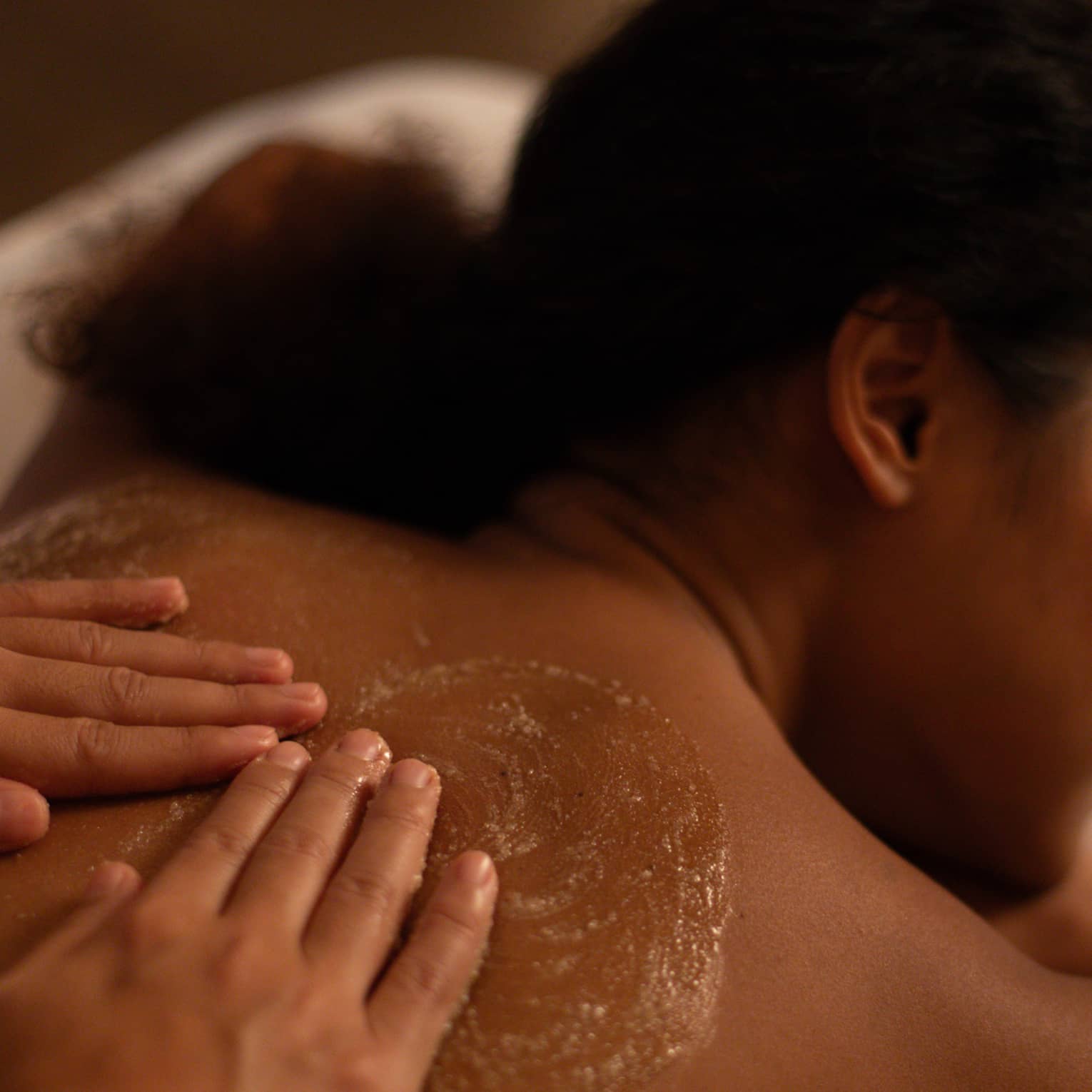 Guest getting a back massage.