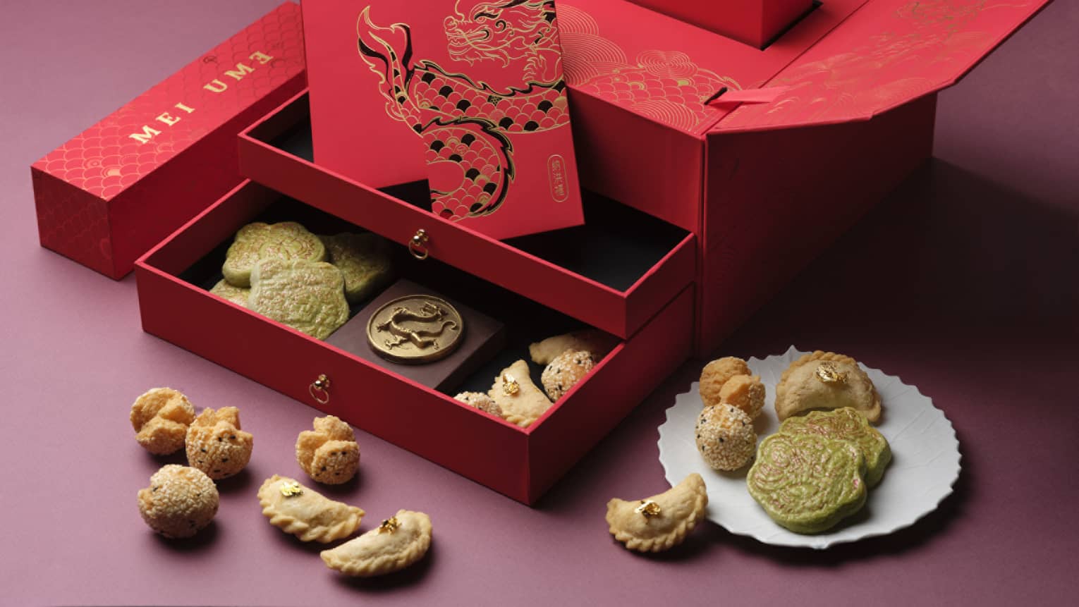 Open Mei Ume red gift box with sweet treats inside and out