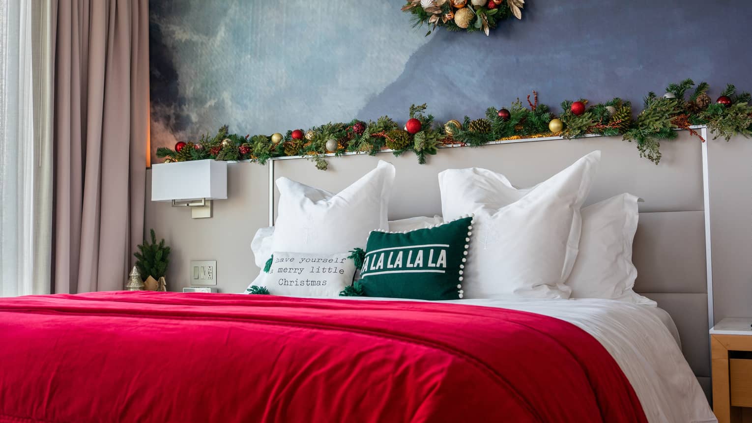 Festive guest room at Four Seasons Hotel St. Louis, with garland and wreath