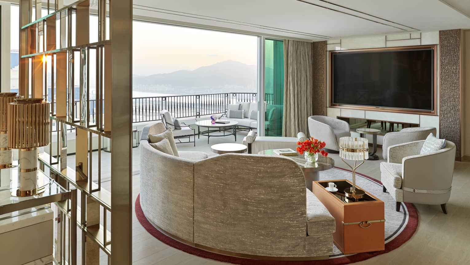 The Grand Suite with sun shining through the drapes