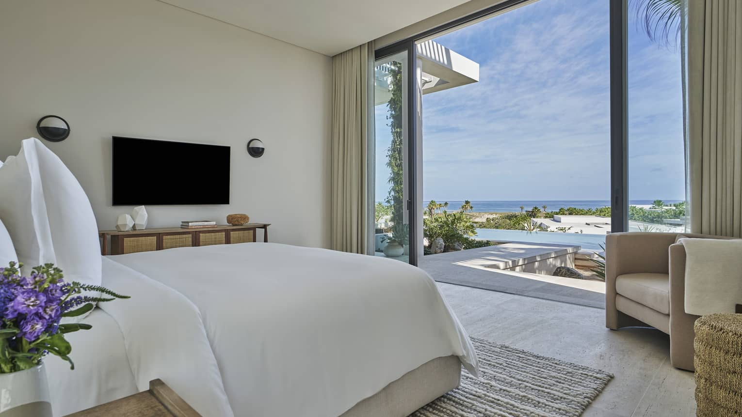 View from a bedroom looking out to a private terrace at at Four Seasons Resort and Residences Los Cabos