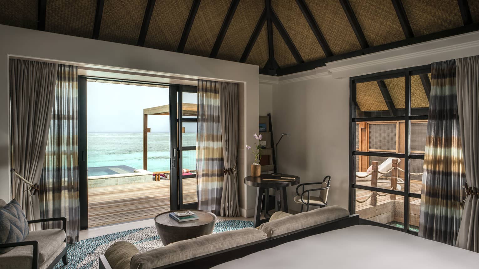 A calming sea view from inside a water suite